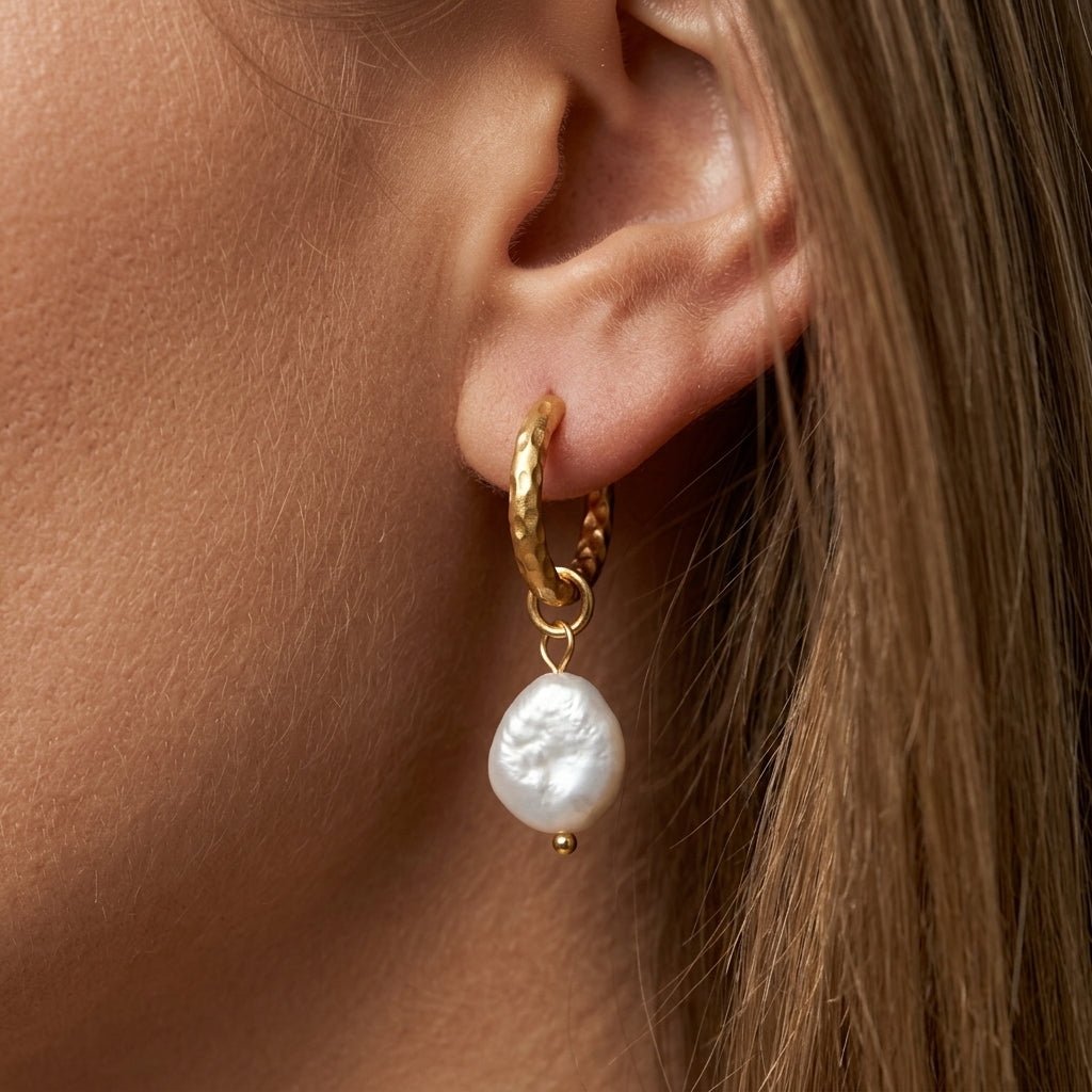 baroque pearl hoops hammered gold hoop earrings with a natural baroque pearl drop for an elegant bridal inspired jewelry and bridesmaid earrings look