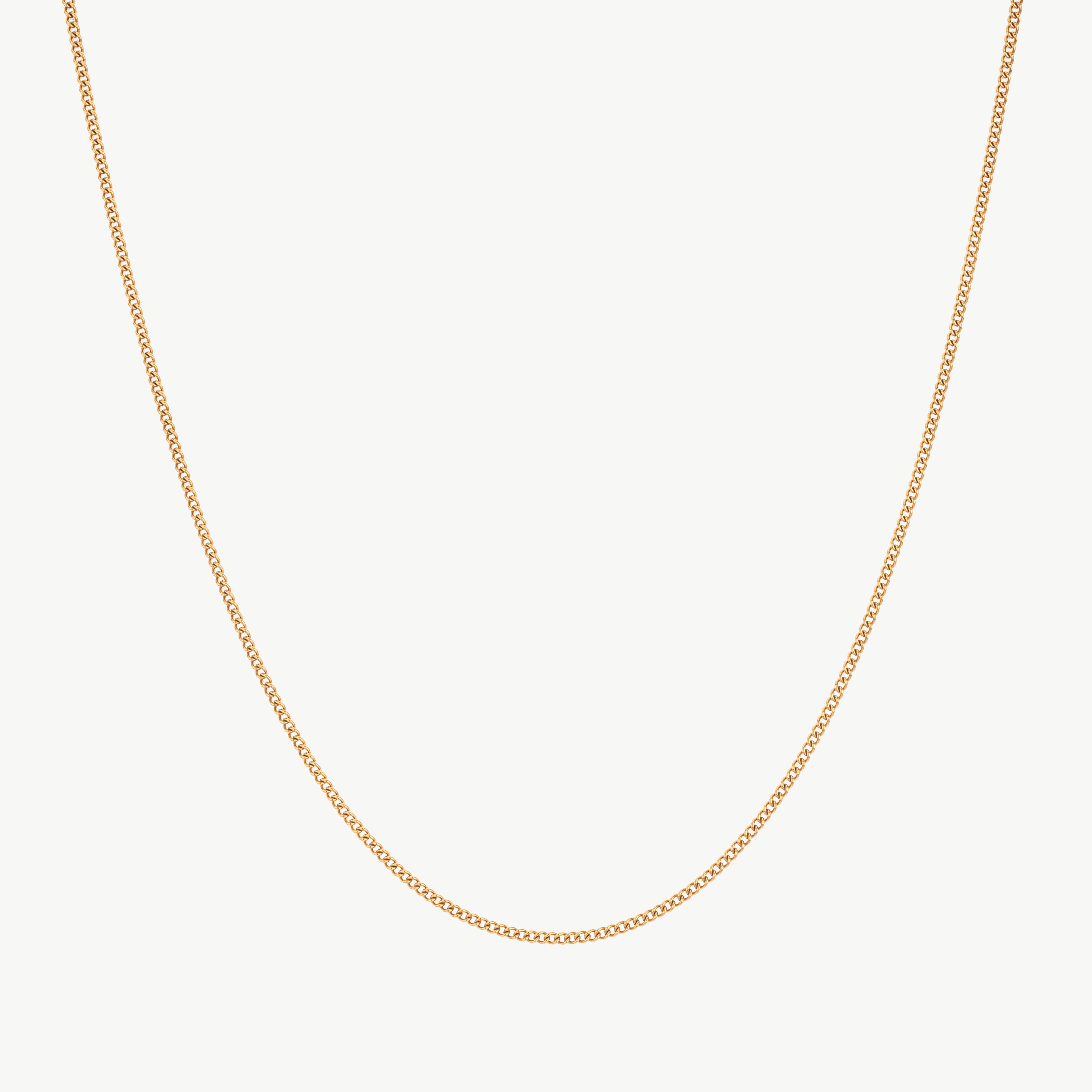 cable chain necklace in gold with round links, gold cable chain necklace forming a classic cable chain necklace that sits evenly along the neckline