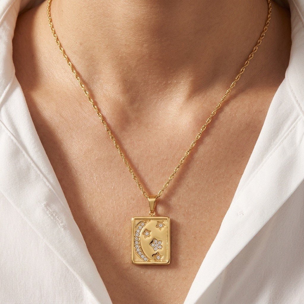 celestial moon stars gold necklace featuring a crescent moon and crystal star details