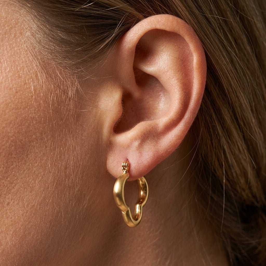 clover earrings chunky gold clover hoop earrings with sculpted organic shape statement jewelry modern gold earrings everyday style