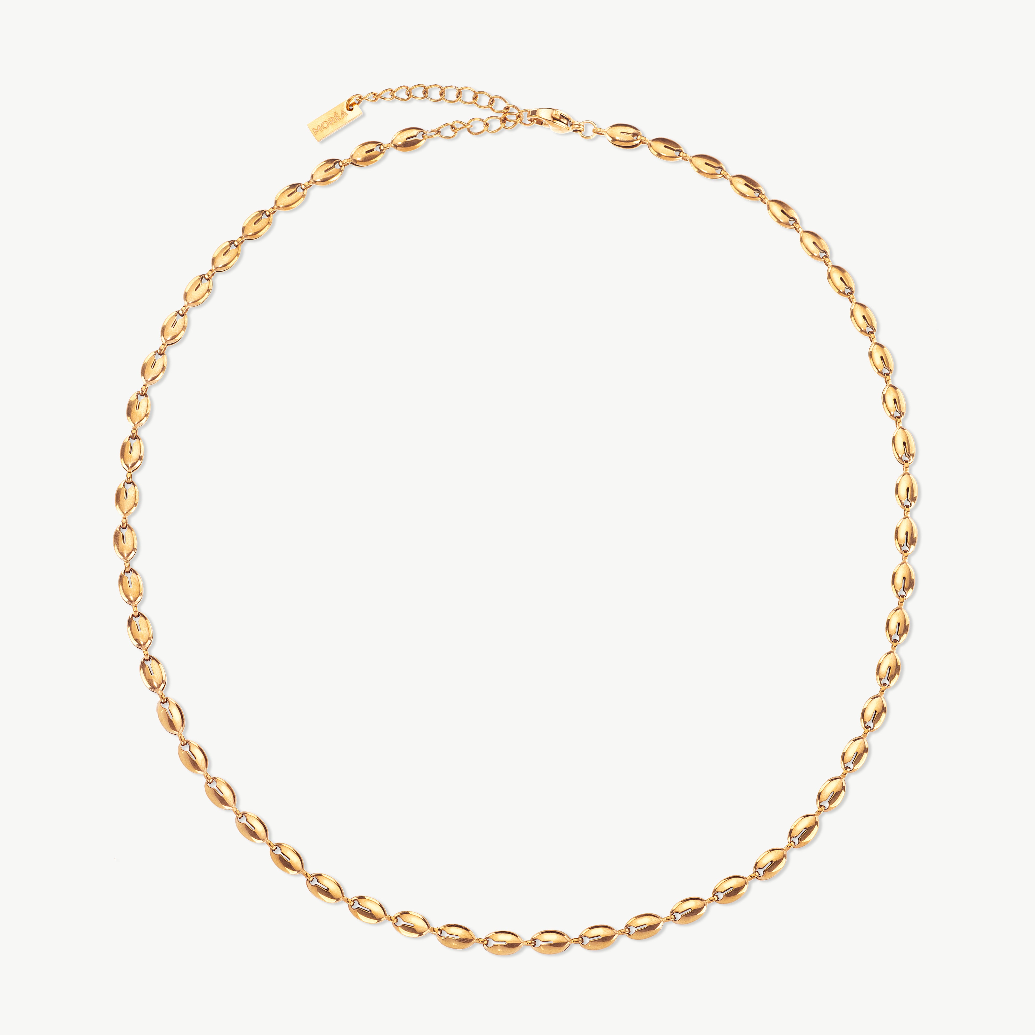 coffee bean necklace in gold with rounded bean links, gold coffee bean necklace styled as a gold choker necklace sitting close along the neckline gold beaded choker