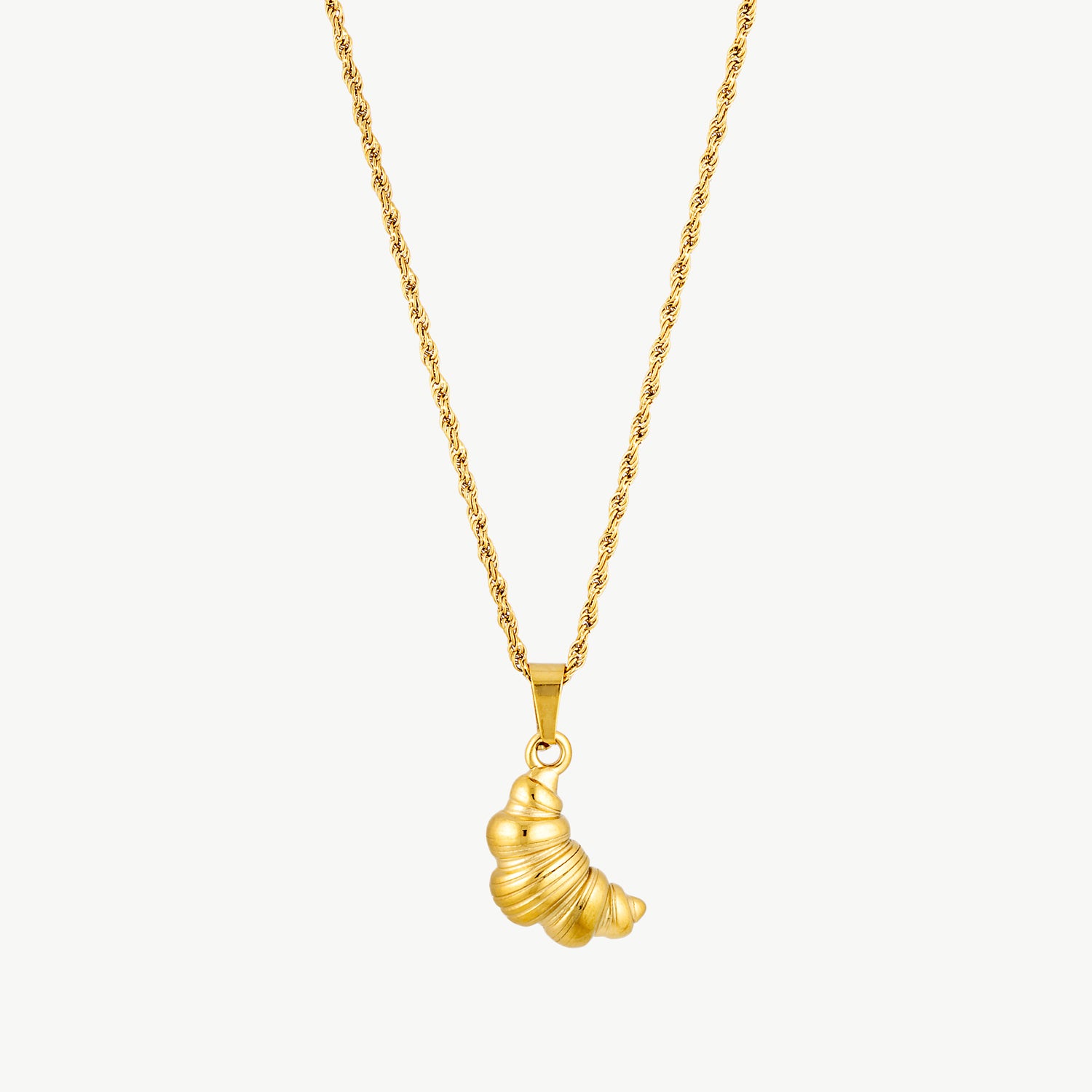 croissant necklace with a detailed gold croissant pendant