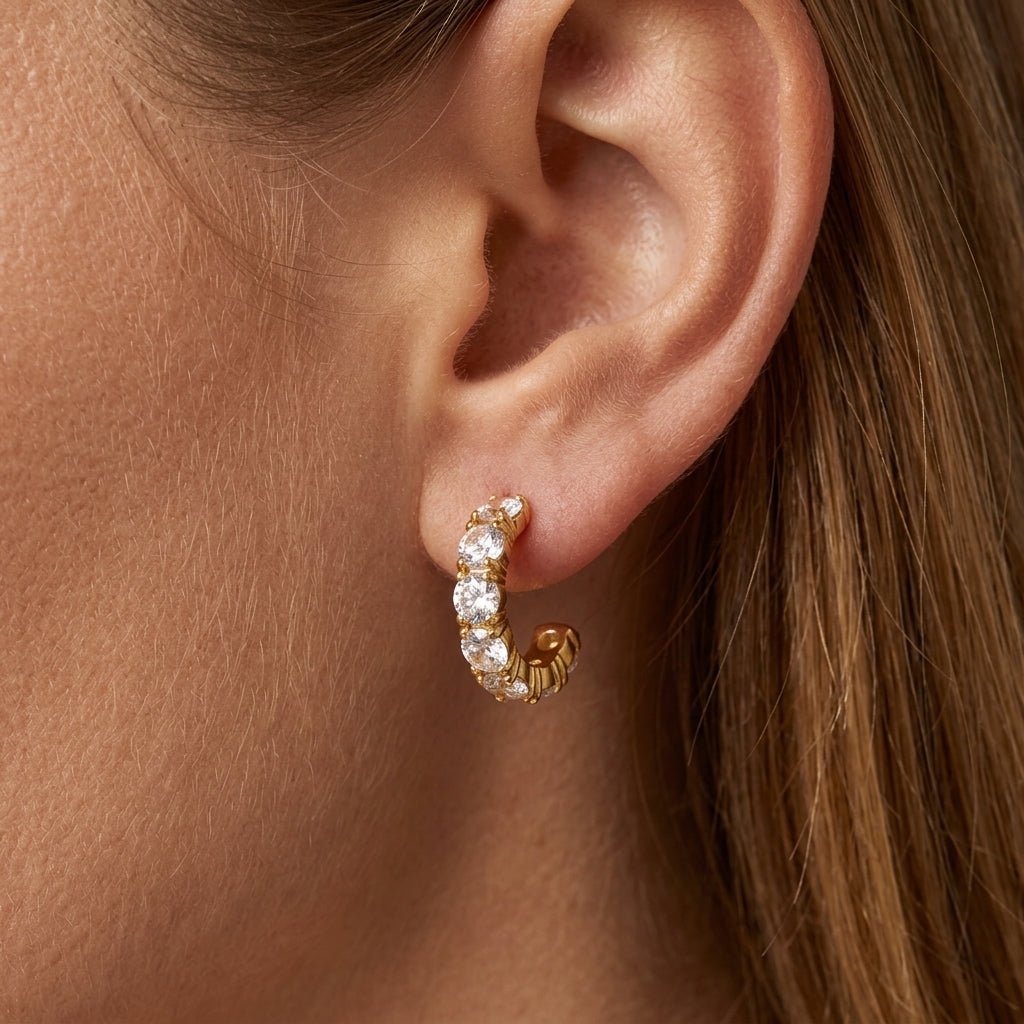 cubic zirconia huggie hoop earrings gold huggie earrings with sparkling cubic zirconia stones for an elegant everyday earrings or evening earrings look