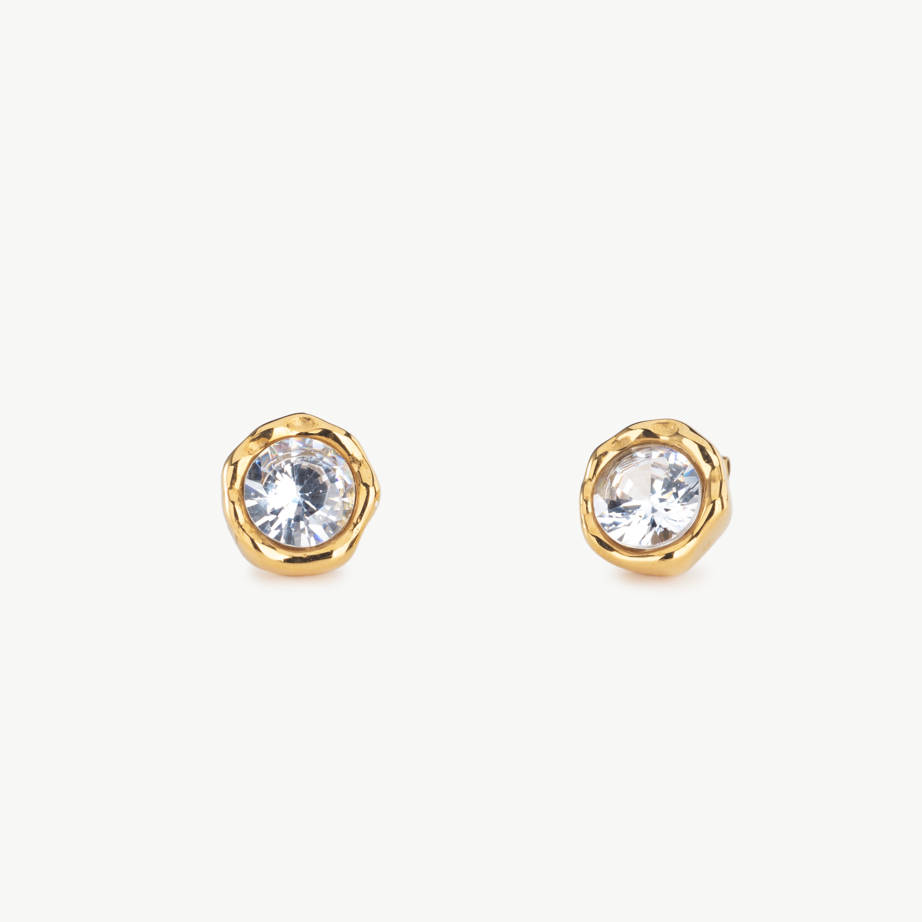 cubic zirconia studs gold cz stud earrings with sparkling round crystal stones set in polished gold for elegant everyday and evening jewelry styling hammered gold stud earrings