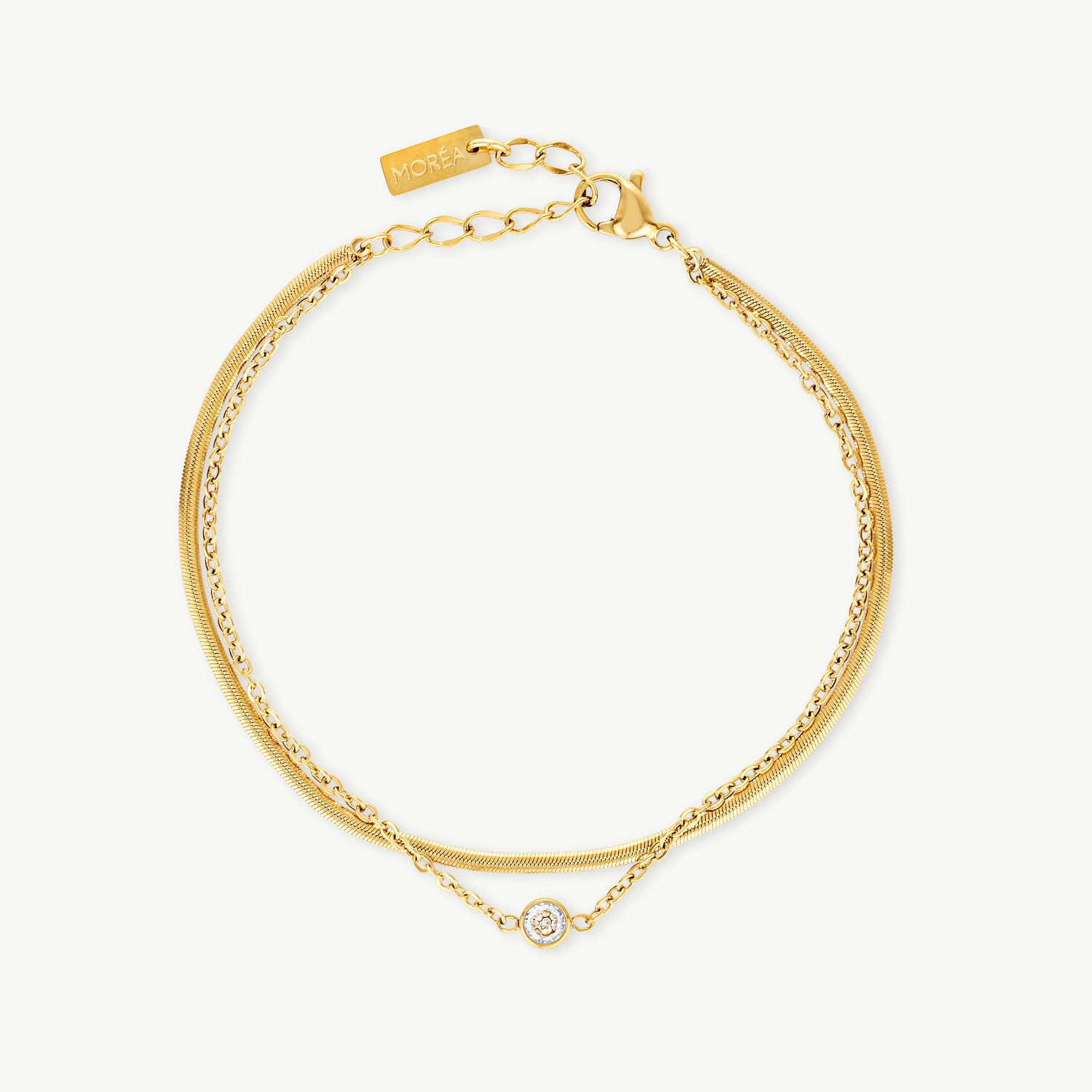 double chain bracelet with two delicate gold chains and a cubic zirconia centerpiece