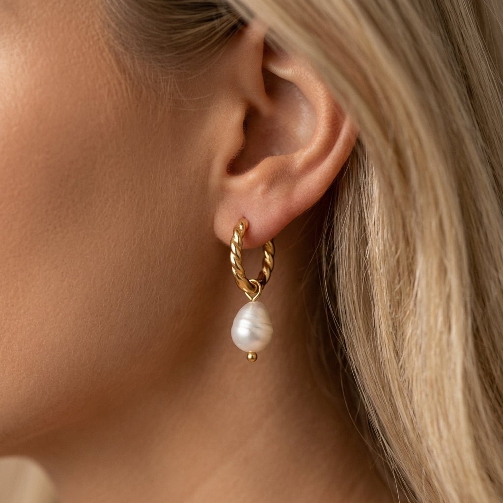 earrings with pearl drops twisted gold hoop earrings with dangling freshwater pearl charms, designed with an elegant romantic feel perfect for bridesmaid earrings, bride earrings, wedding earrings and timeless pearl jewelry styling with a soft modern finish