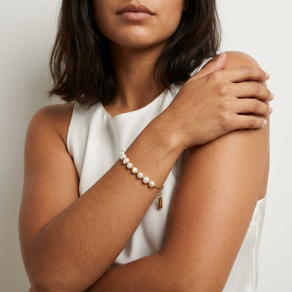 elegant freshwater pearl bracelet for women featuring a row of softly shimmering white pearls and gold chain detailing for a refined feminine style