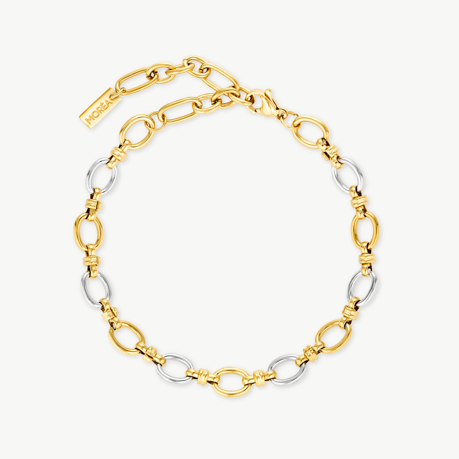 gold and silver bracelet with alternating polished two-tone oval links