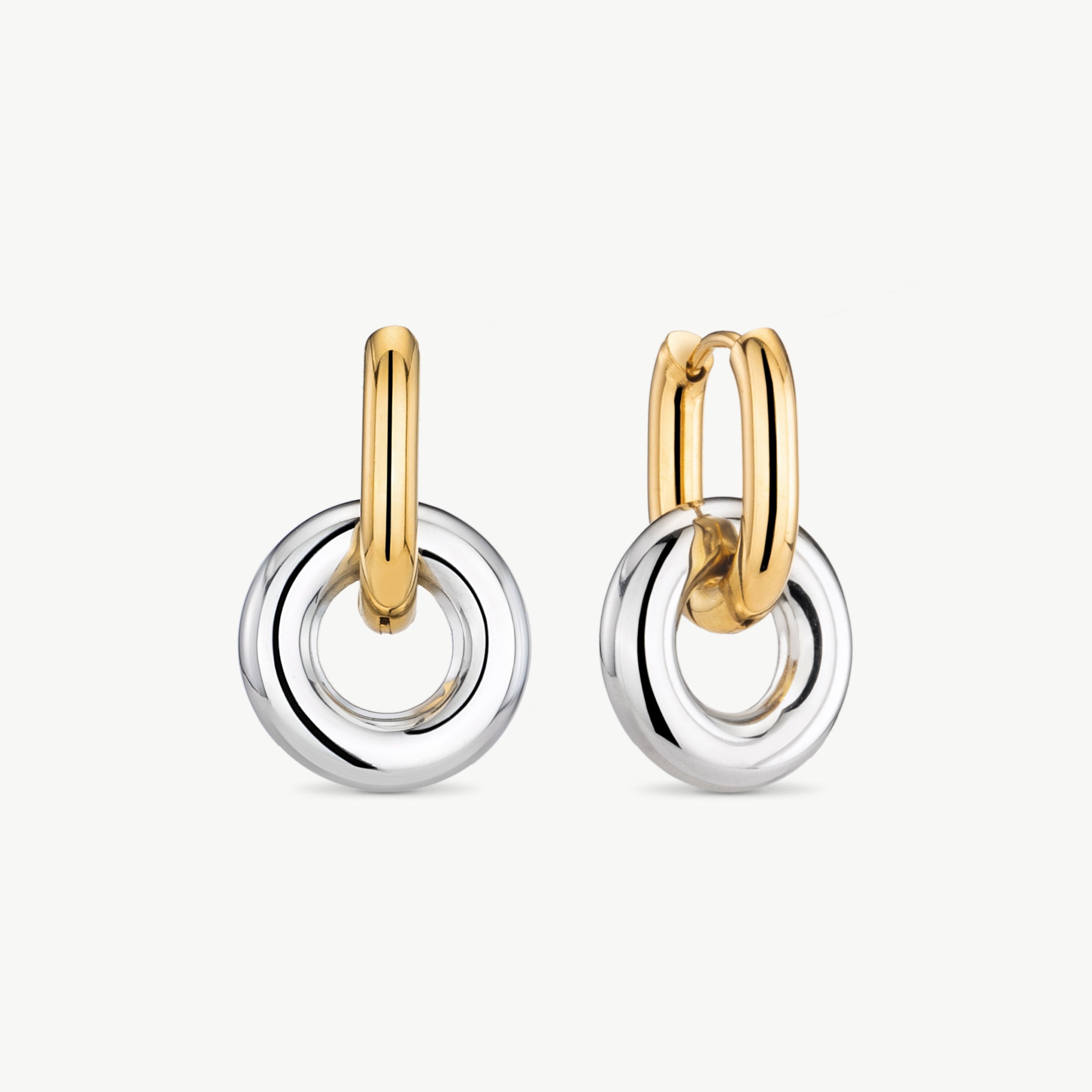 gold and silver hoop earrings two tone double hoop earrings with mixed metal earrings design combining gold and silver hoops in modern chunky earrings style