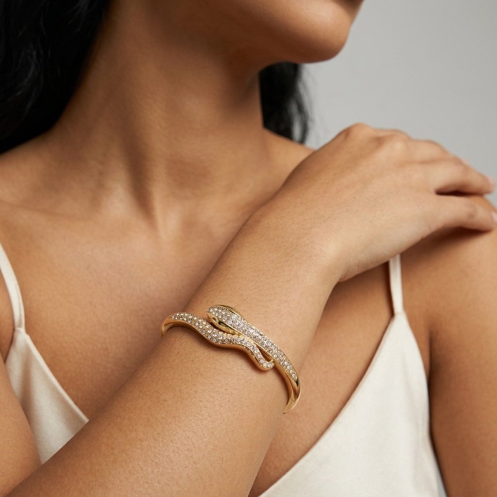 gold crystal snake statement cuff featuring a sculptural serpent design for women