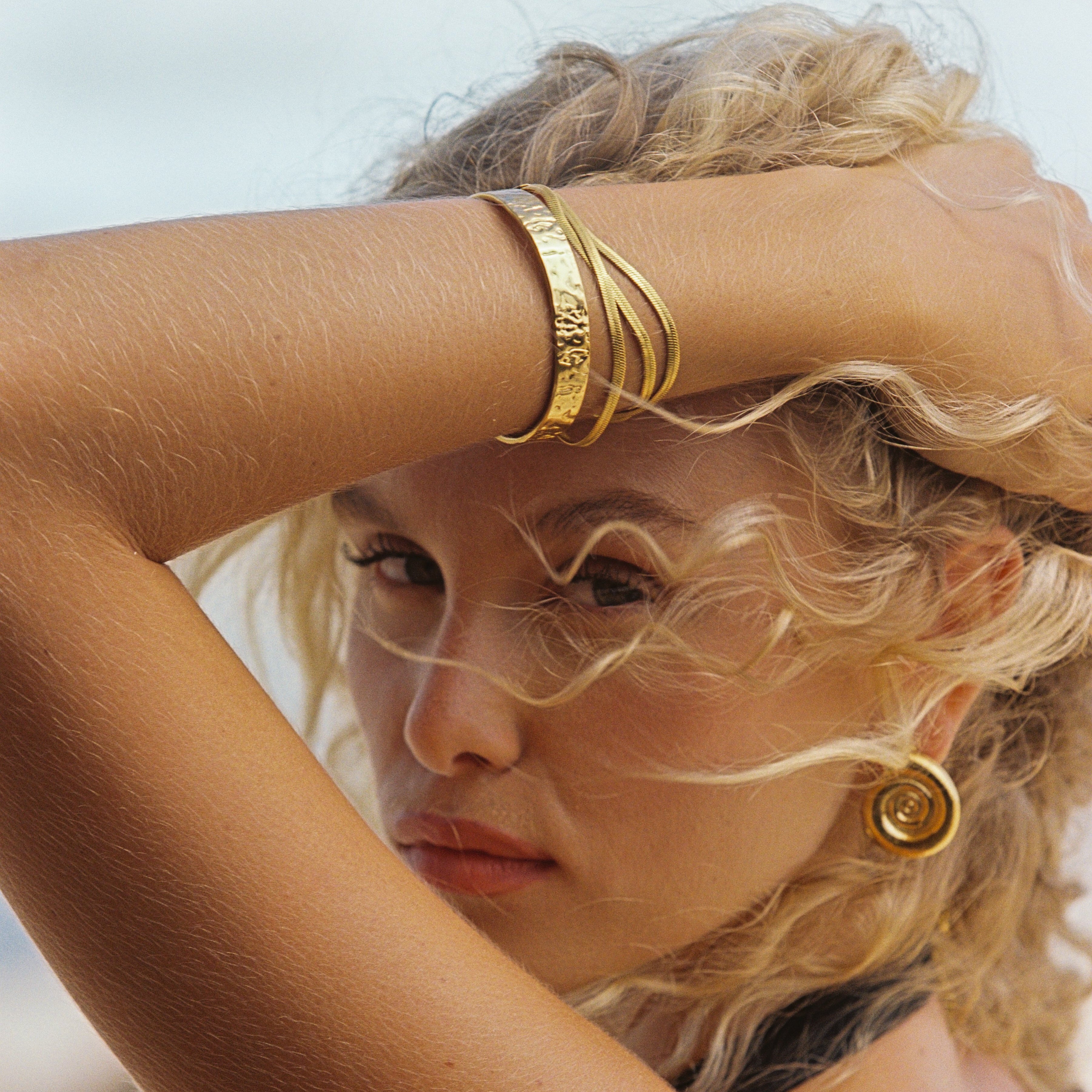 gold cuff modern open cuff bracelet with a minimalist gold finish perfect for stacking, layering and everyday or evening wear