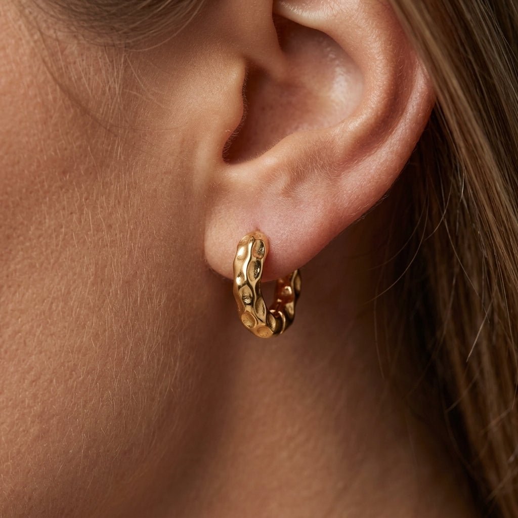 gold hoop earrings hammered chunky gold hoop earrings featuring a softly hammered texture and polished finish, designed with a contemporary organic shape that adds effortless sophistication to casual and elevated looks