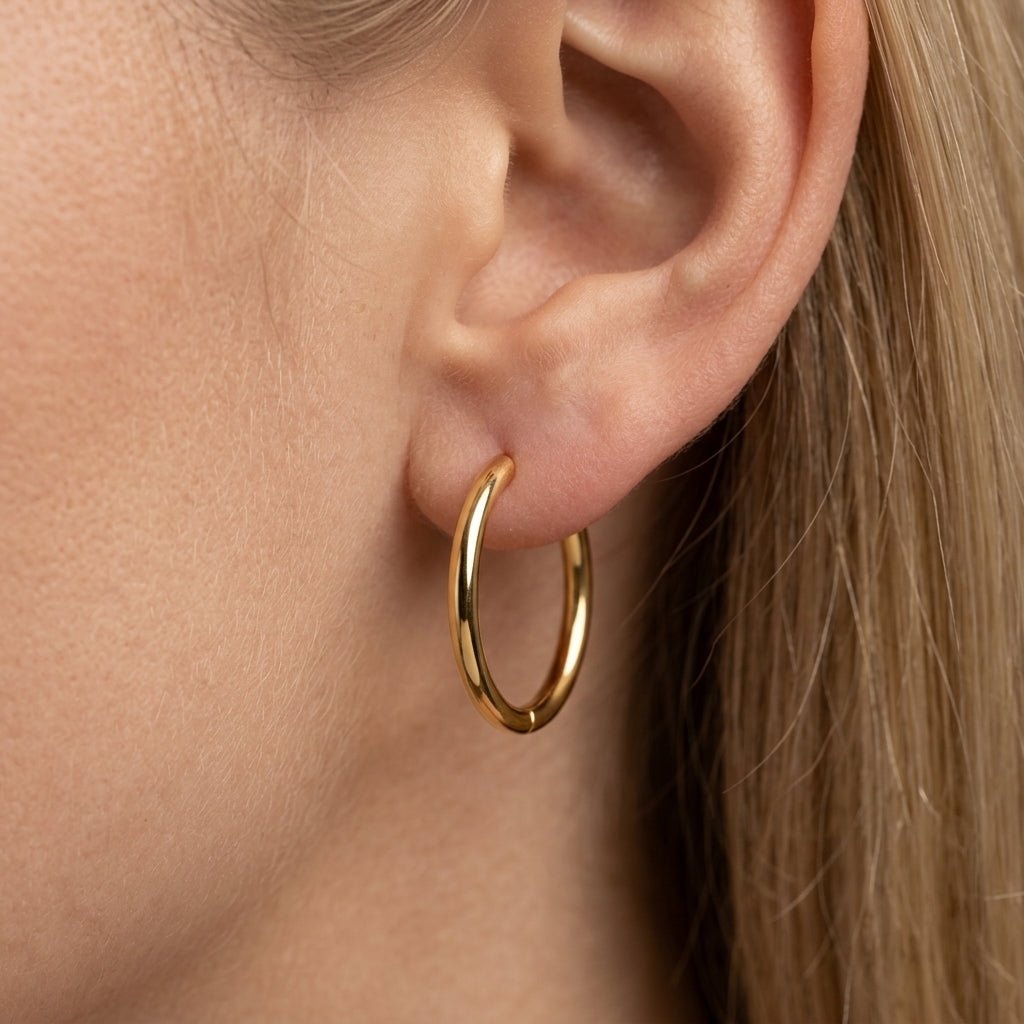 gold hoop earrings classic gold hoop earrings with sleek polished finish minimalist jewelry everyday hoops modern gold jewelry