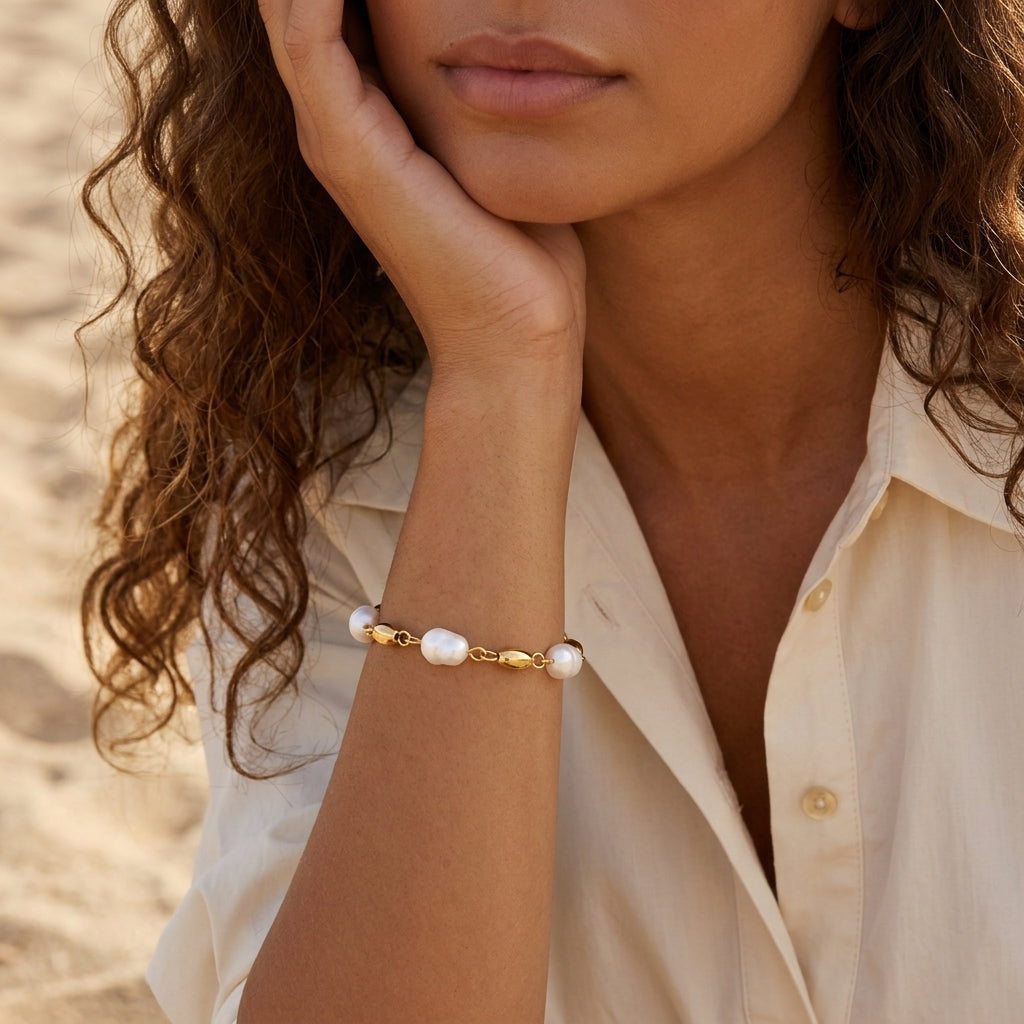 gold pearl bead bracelet for women featuring lustrous white pearls and polished gold oval beads linked together for elegant everyday jewelry styling
