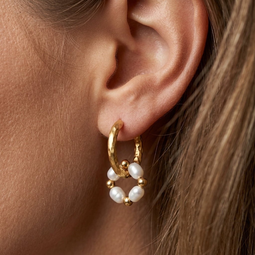 gold pearl hoop earrings hammered gold hoop earrings with a detachable pearl bead charm for a modern coastal inspired jewelry look