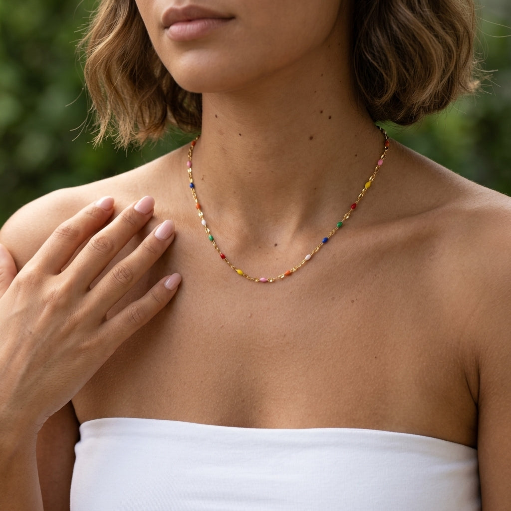 gold rainbow station necklace with multicolor bead details