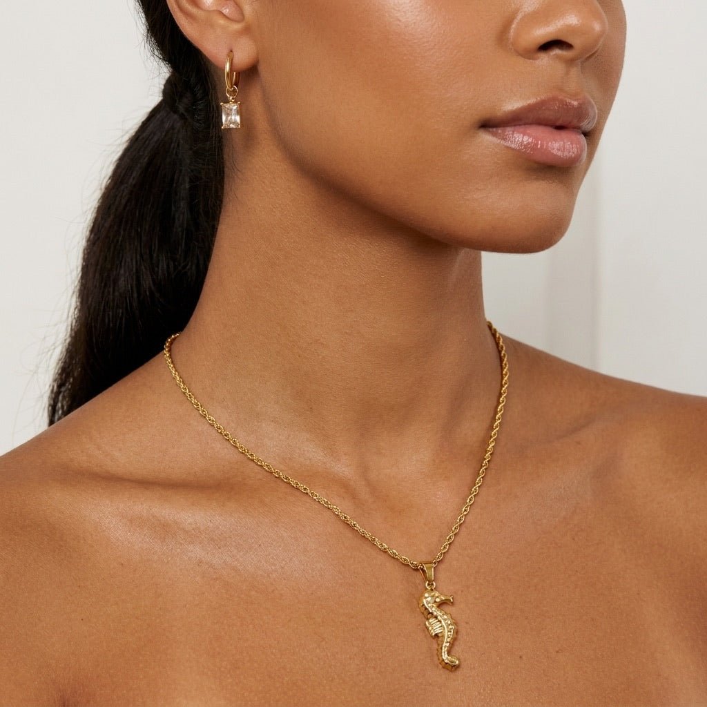 gold seahorse pendant necklace for women with sparkling stone details