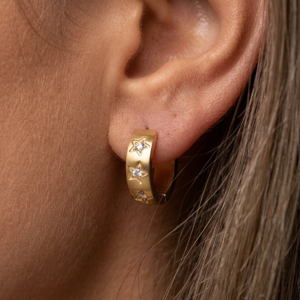 gold star hoop earrings celestial gold huggie hoops with crystal star detailing dreamy night sky inspired waterproof earrings