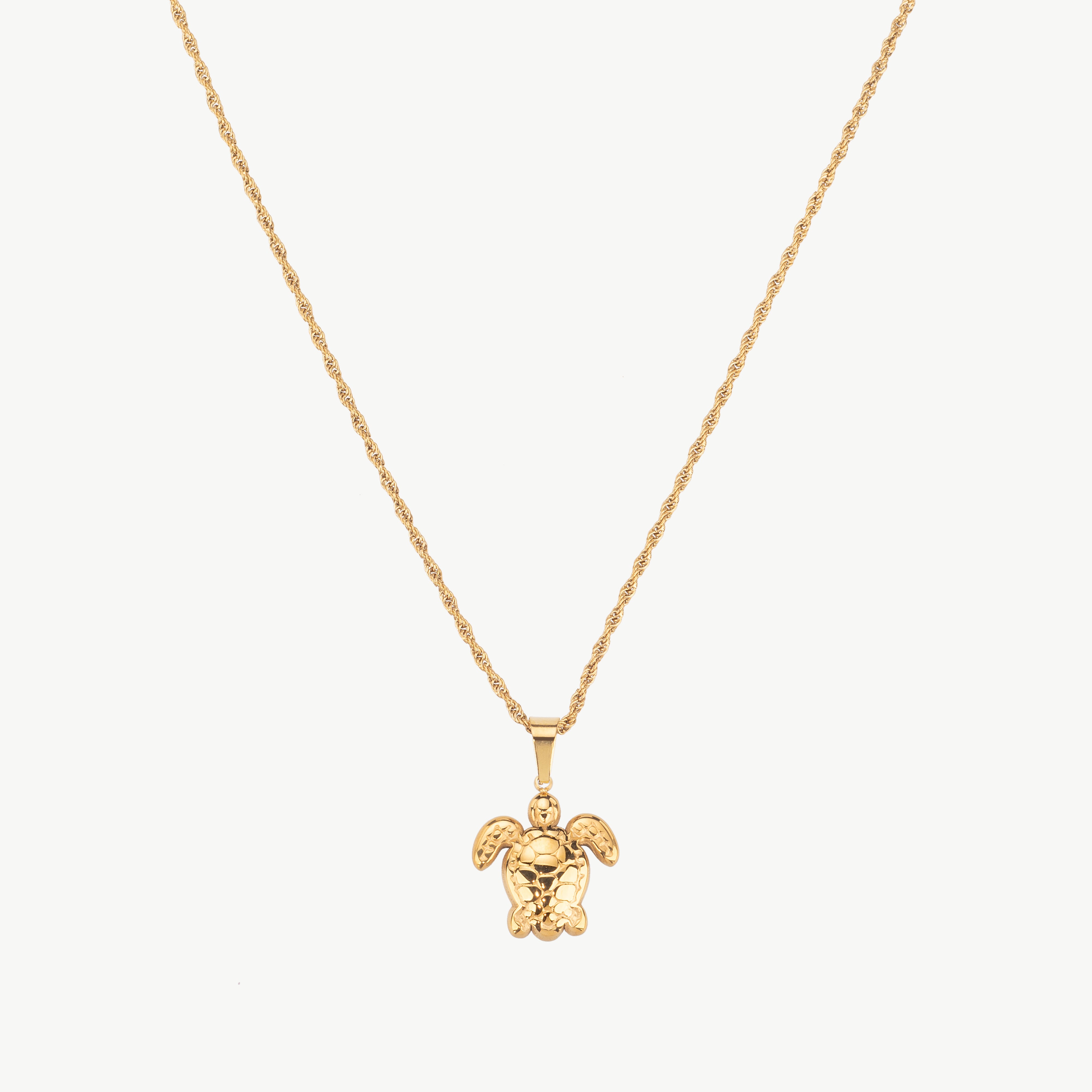 gold turtle necklace with small turtle charm, sea turtle necklace gold and turtle pendant necklace centered along a fine chain