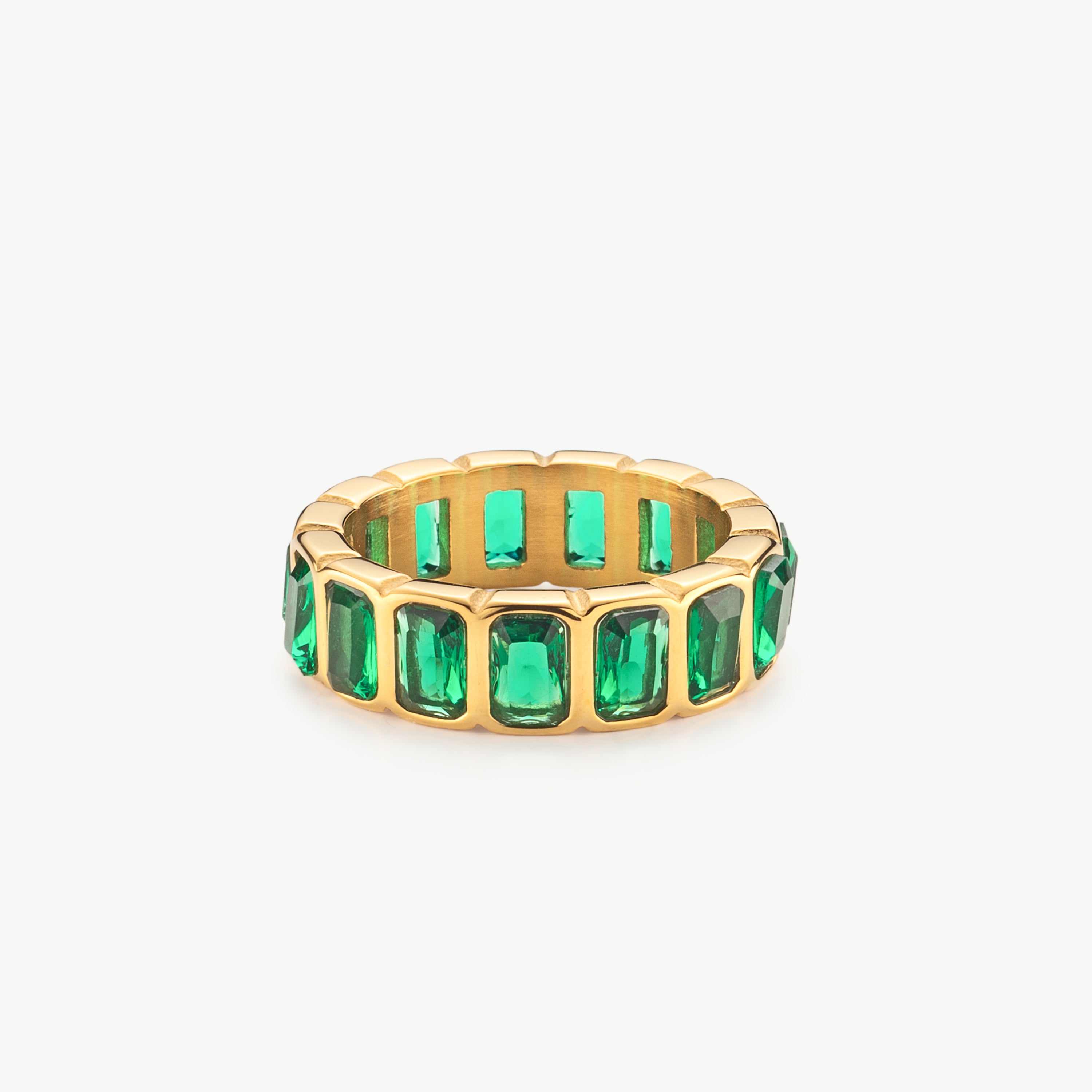 green crystal ring with faceted green cubic zirconia in gold band, elegant green gemstone ring with clean modern finish and refined detail