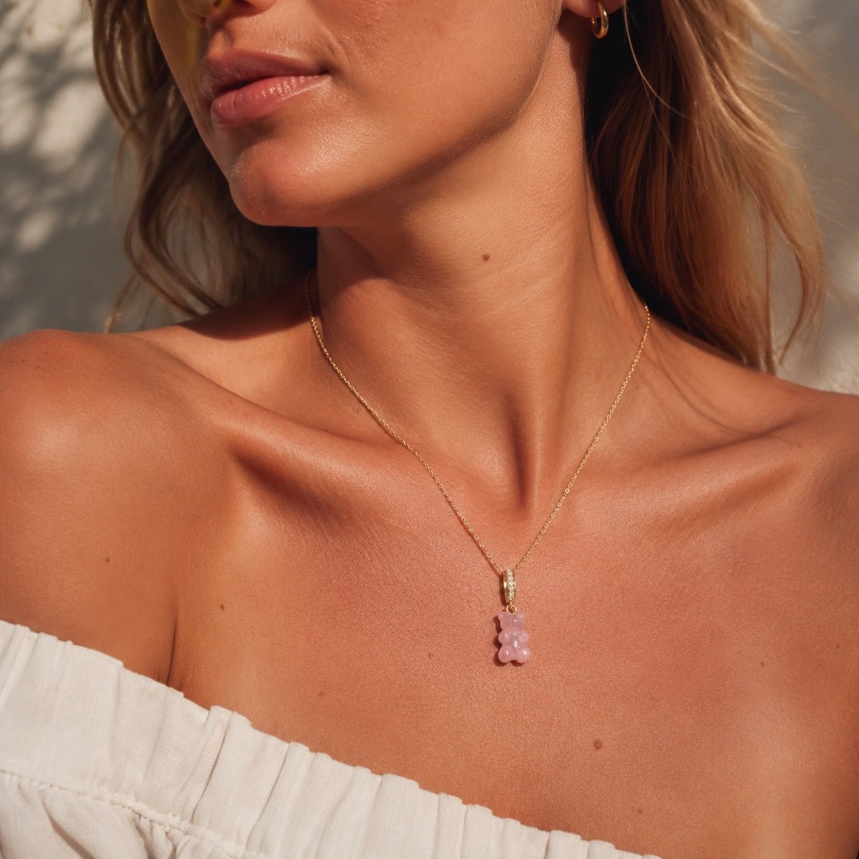 gummy bear necklace with pink teddy pendant and cubic zirconia crystals in waterproof 18k pvd gold