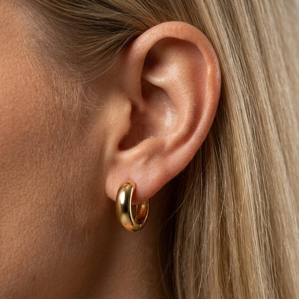 huggie hoop earrings gold chunky gold huggie hoops with smooth polished finish classic everyday earrings capsule wardrobe jewelry