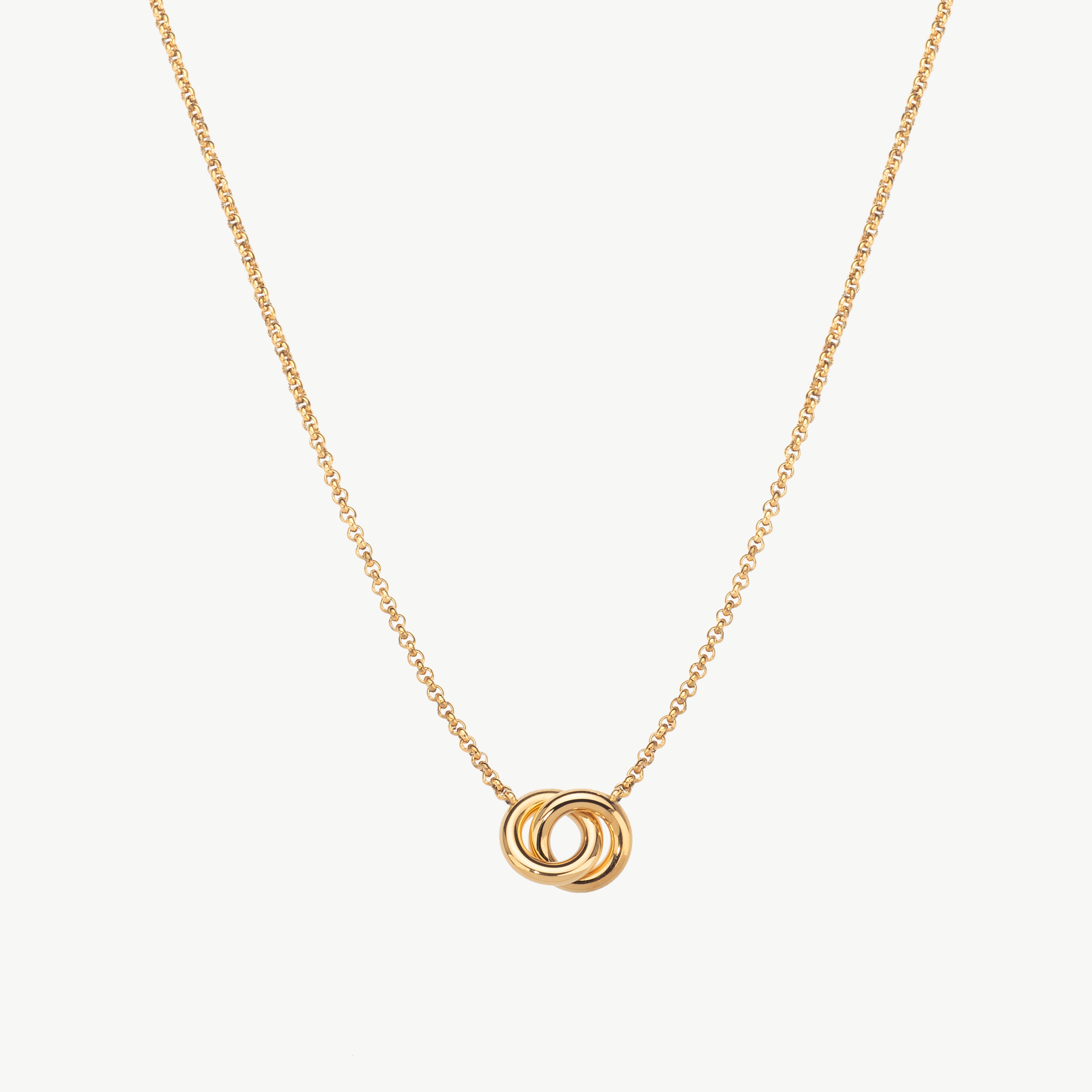 interlocking ring necklace in gold with two linked circles, interlocking circles necklace gold forming a smooth double ring necklace at the center