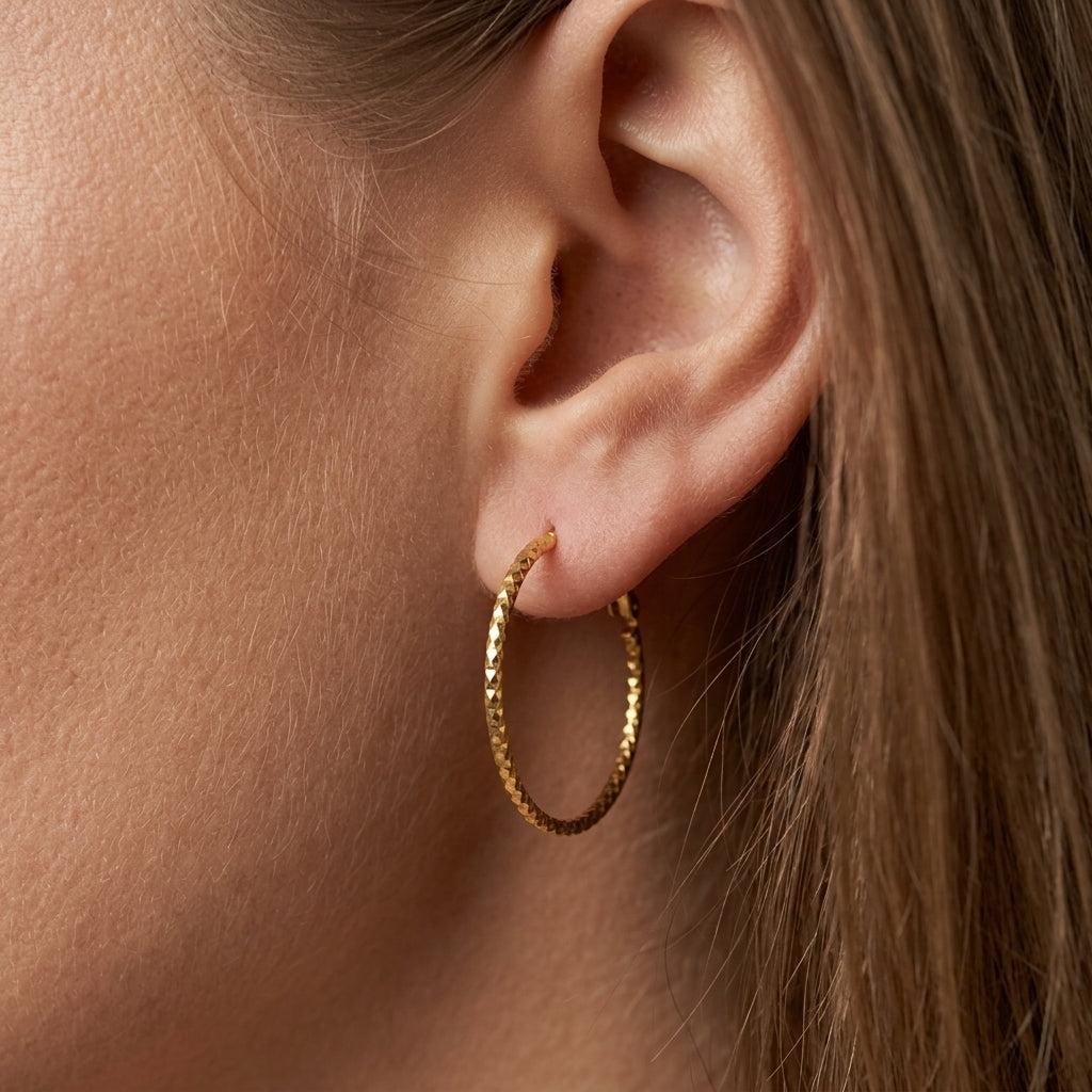 large hoop earrings faceted gold hoop earrings with shimmering textured finish lightweight statement hoops chic everyday jewelry