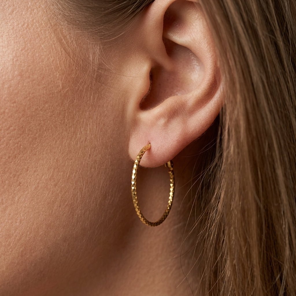large hoop earrings faceted gold hoop earrings with shimmering textured finish lightweight statement hoops chic everyday jewelry