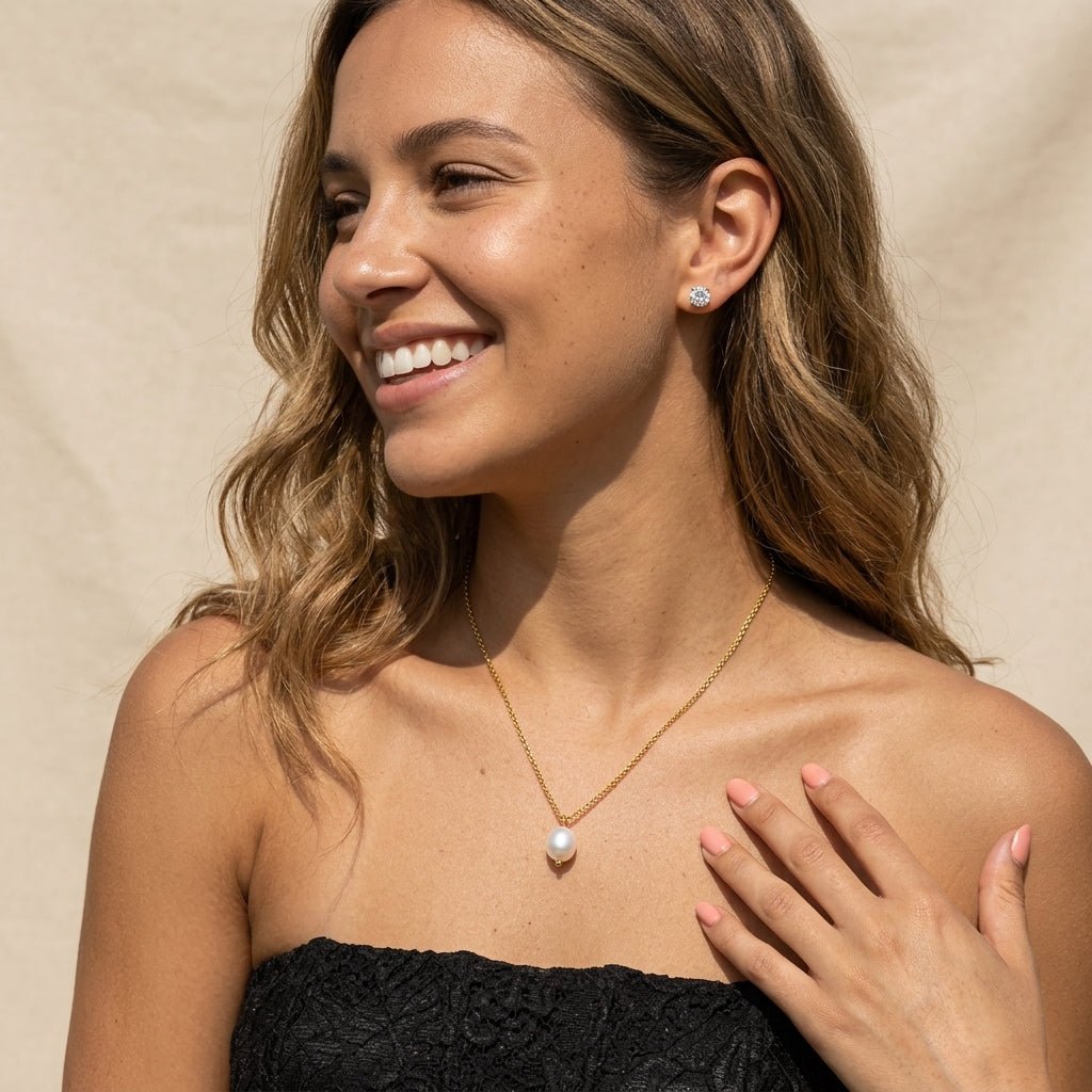 minimalist freshwater pearl necklace with a delicate gold chain