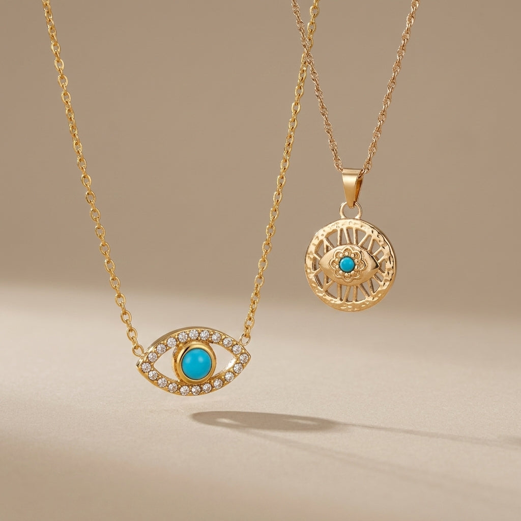 minimalist gold necklace featuring a blue evil eye pendant on a fine chain worn by a woman for a chic summer jewelry look
