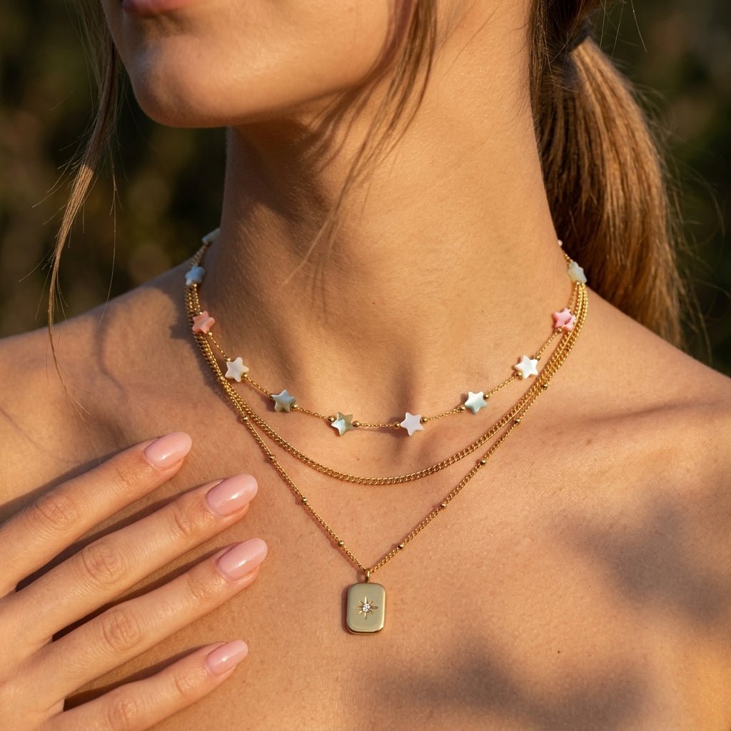 multicolor star necklace with colorful stars spaced along a delicate chain