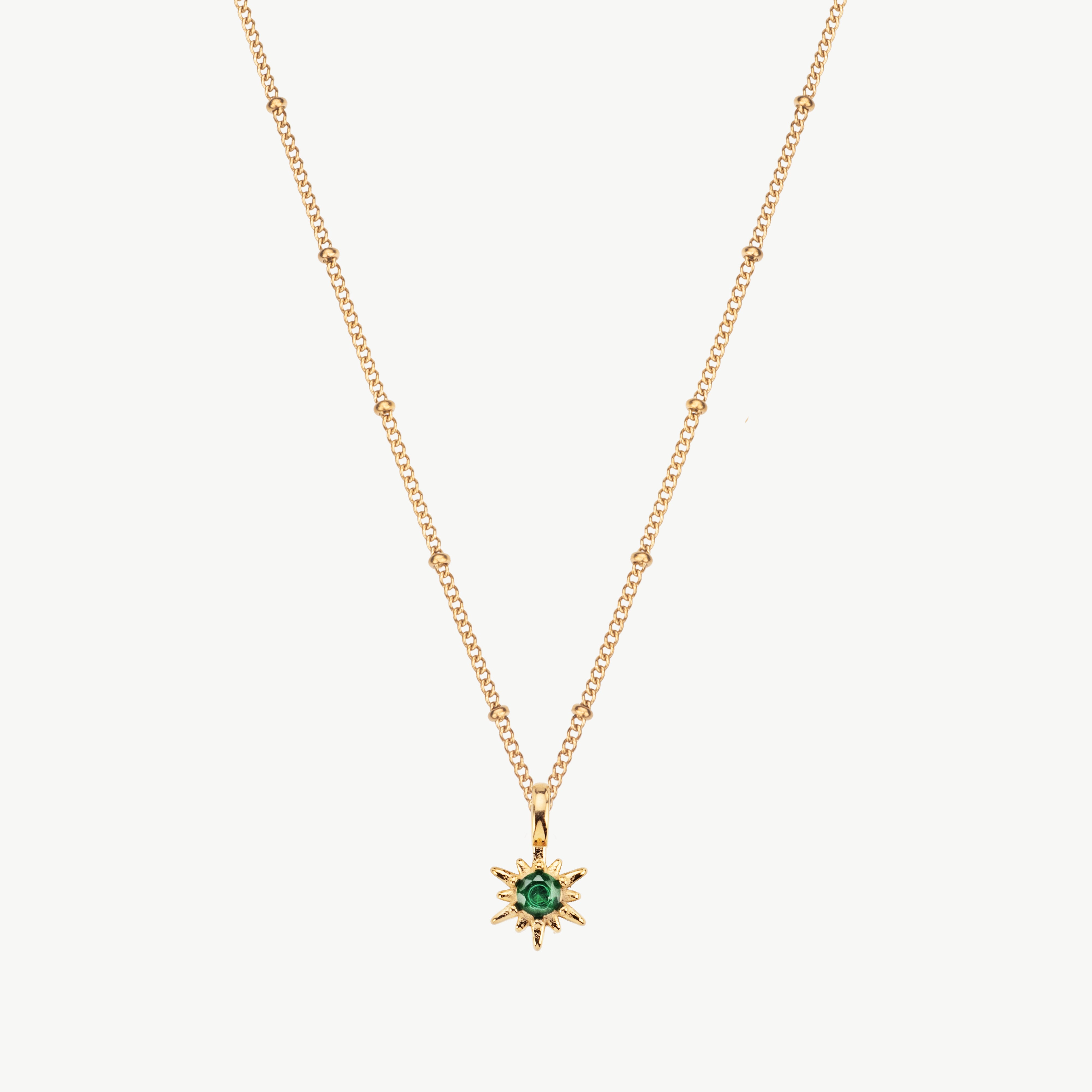 north star pendant necklace gold north star pendant necklace with green stone pendant necklace and green star necklace detail