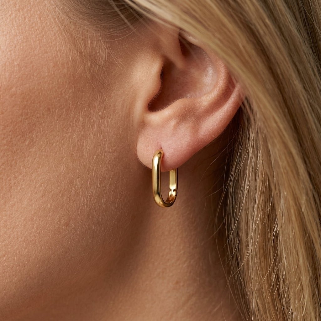 oval hoop earrings sleek gold oval hoops with a modern elongated shape minimalist jewelry everyday essentials timeless gold hoop earrings