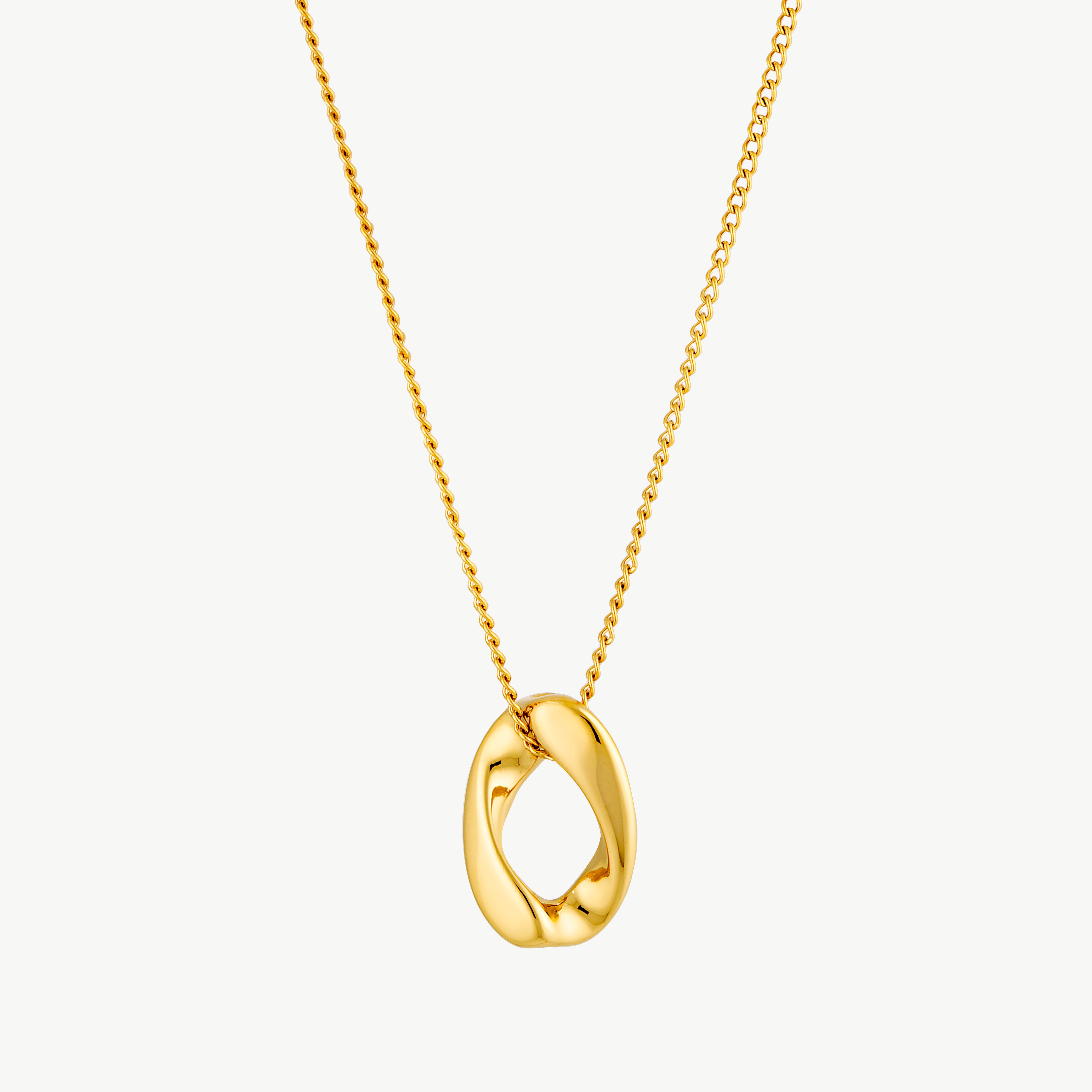 oval pendant necklace with sculptural open center gold pendant and smooth curved polished finish on a delicate gold chain