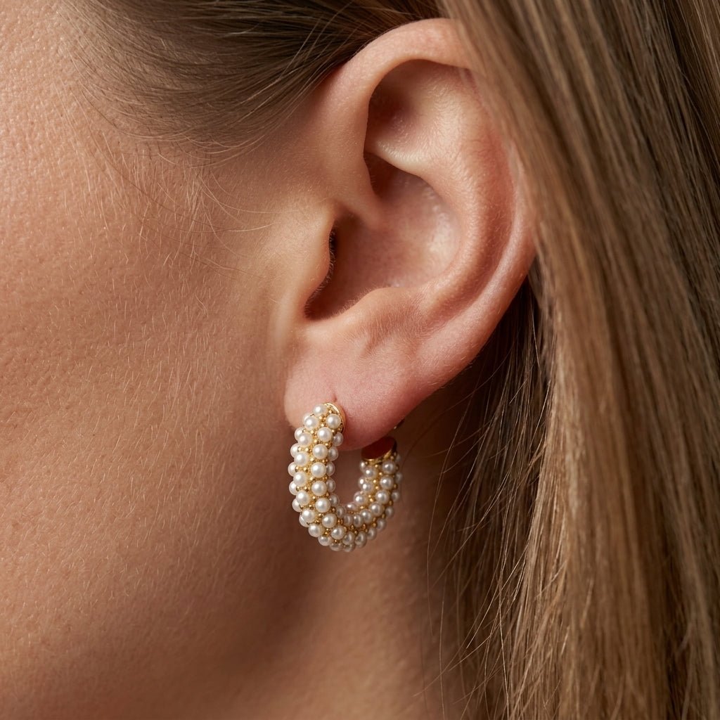 beaded pearl earrings pearl embellished hoop earrings with gold detailing feminine statement jewelry luxe bridal inspired waterproof earrings