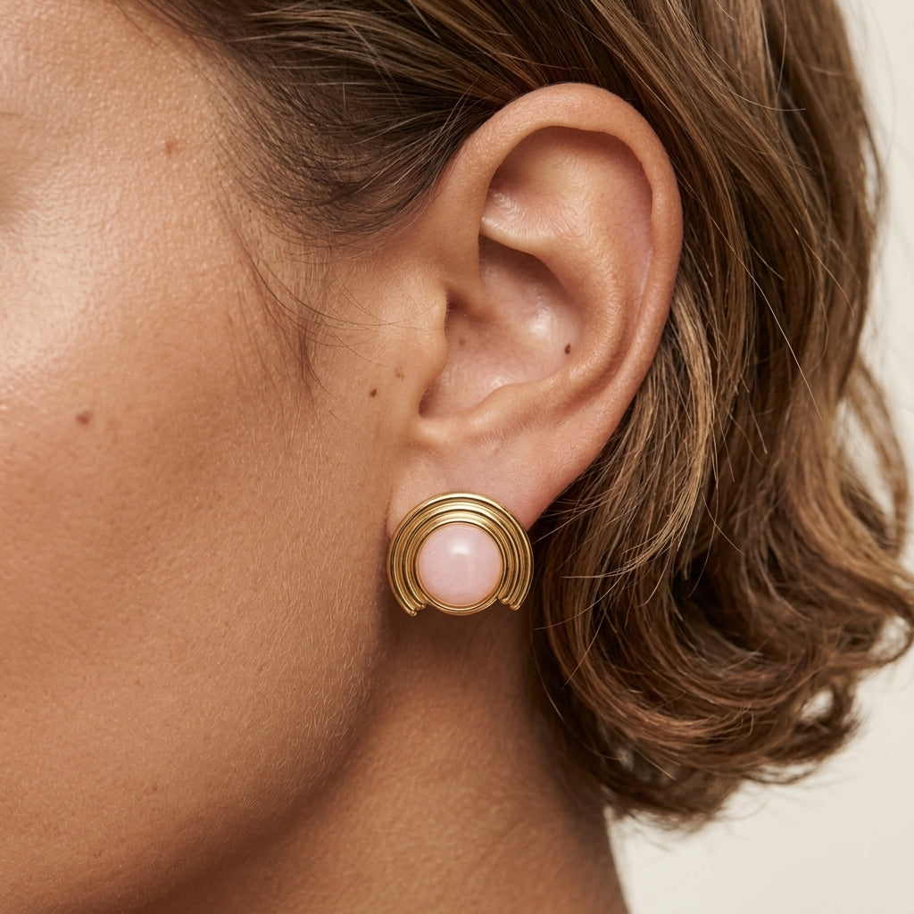 pink and gold stud earrings with a round statement style