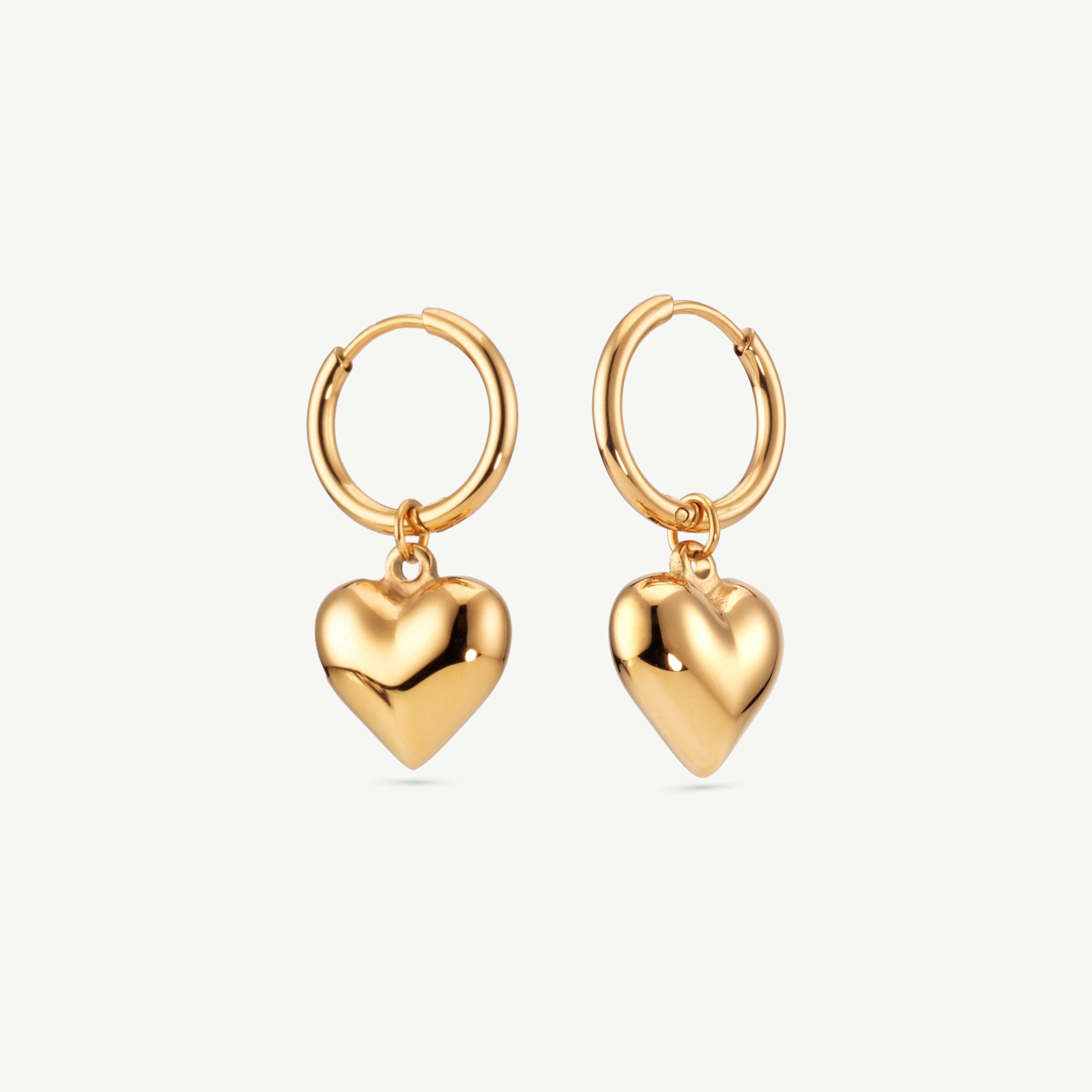 puffy heart earrings gold puffy heart earrings with sculptural drop design creating modern gold heart drop earrings look