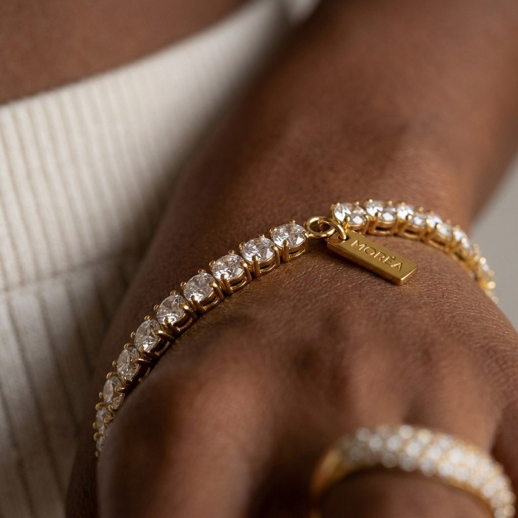 round CZ gold tennis bracelet with sparkling cubic zirconia stones in a classic delicate design