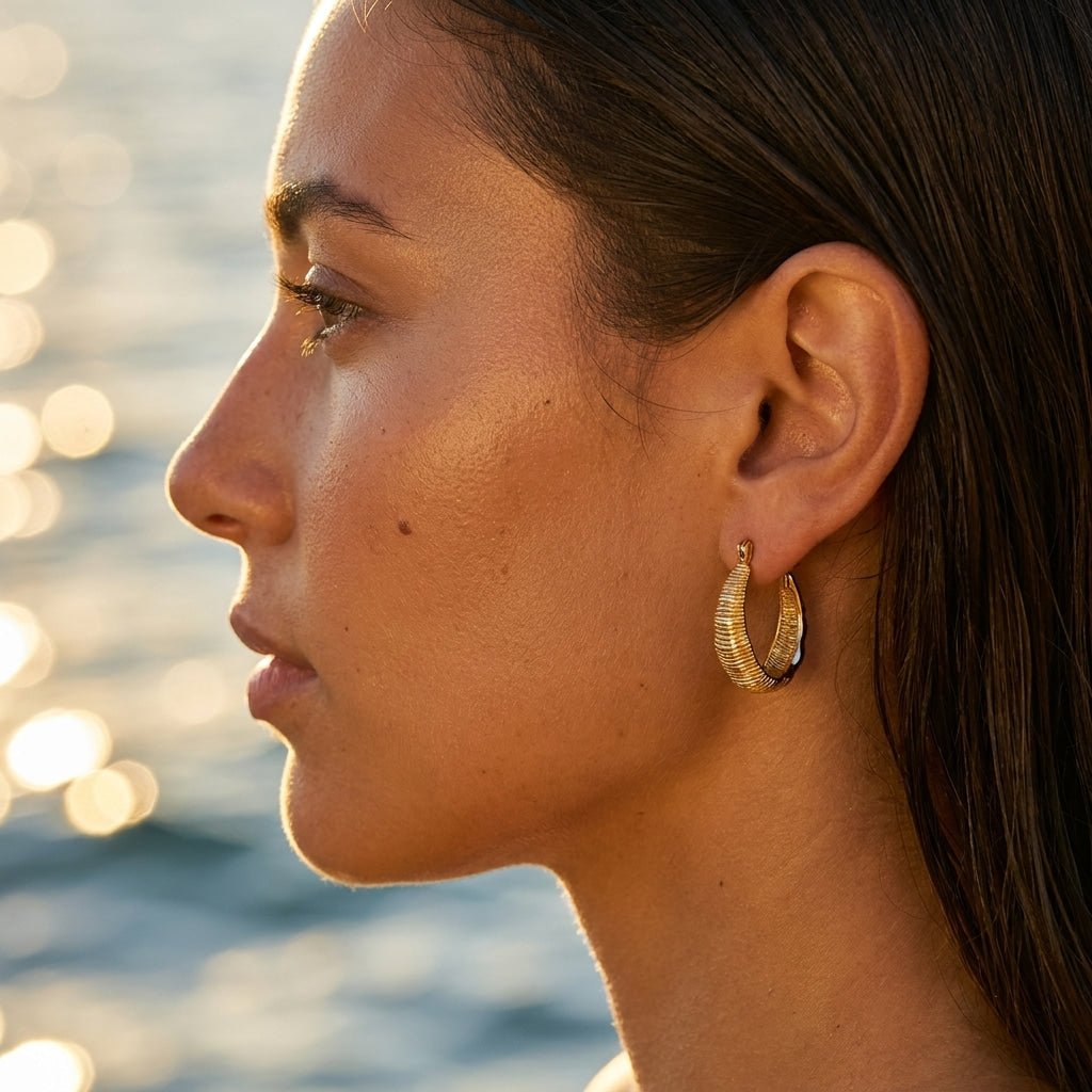 sculptural gold dome earrings with bold rounded statement design