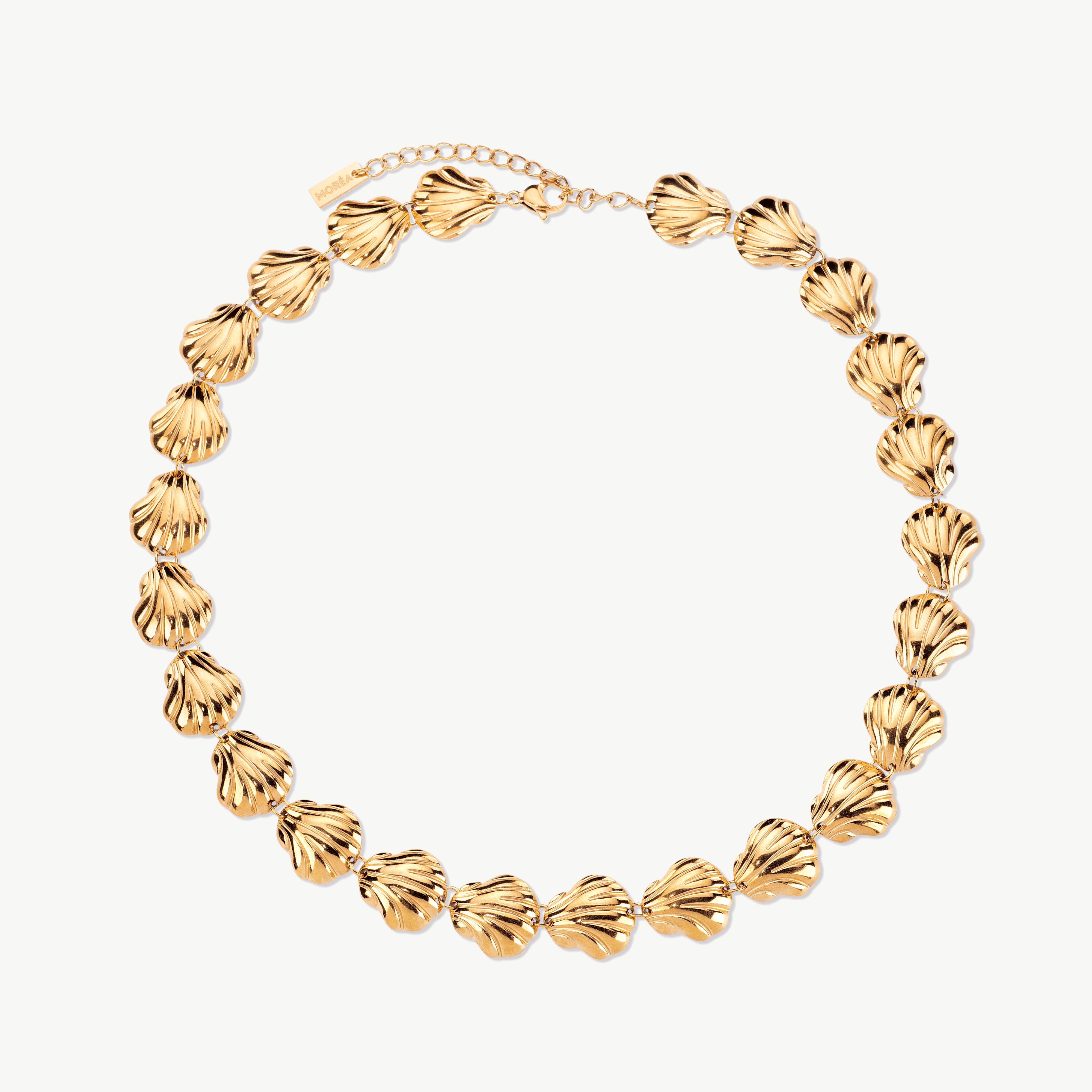 seashell choker in gold with small shell details, necklace with seashells arranged and styled like gold seashell necklace