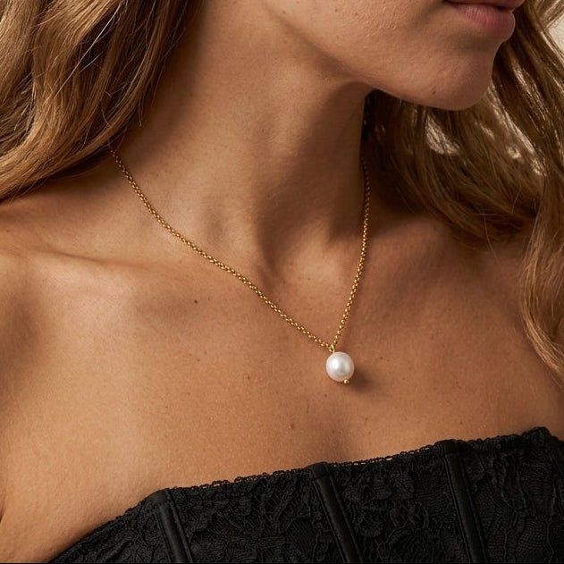solitaire pearl necklace with a single white pearl