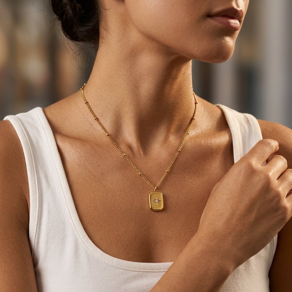 gold star charm pendant necklace with sparkling celestial star detail