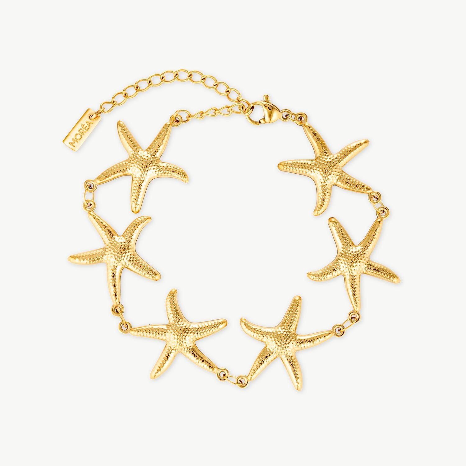 starfish bracelet gold textured starfish charm bracelet in polished gold inspired by ocean jewelry and luxury beach bracelets