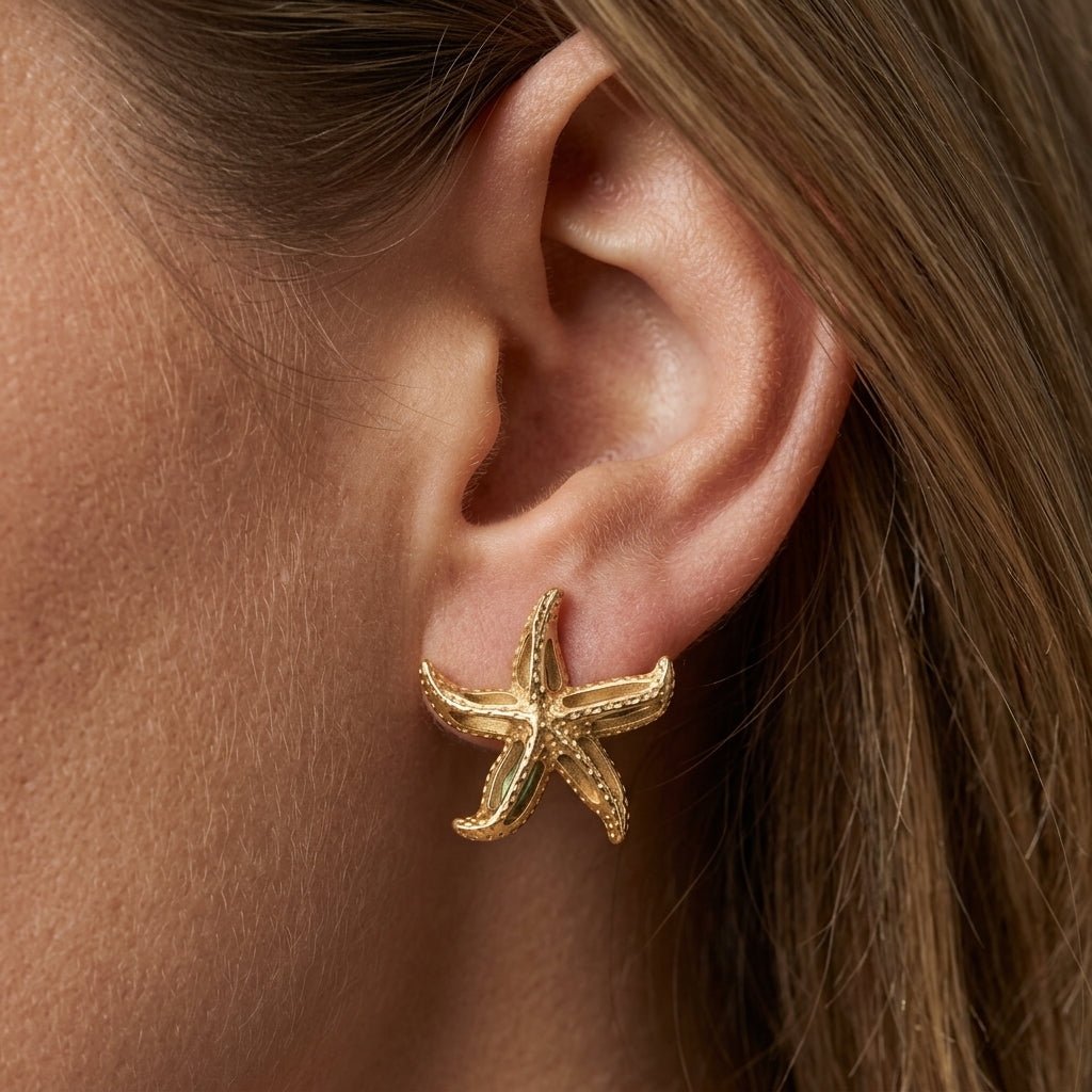 starfish stud earrings textured gold starfish earrings seaside inspired statement studs ocean themed earrings design