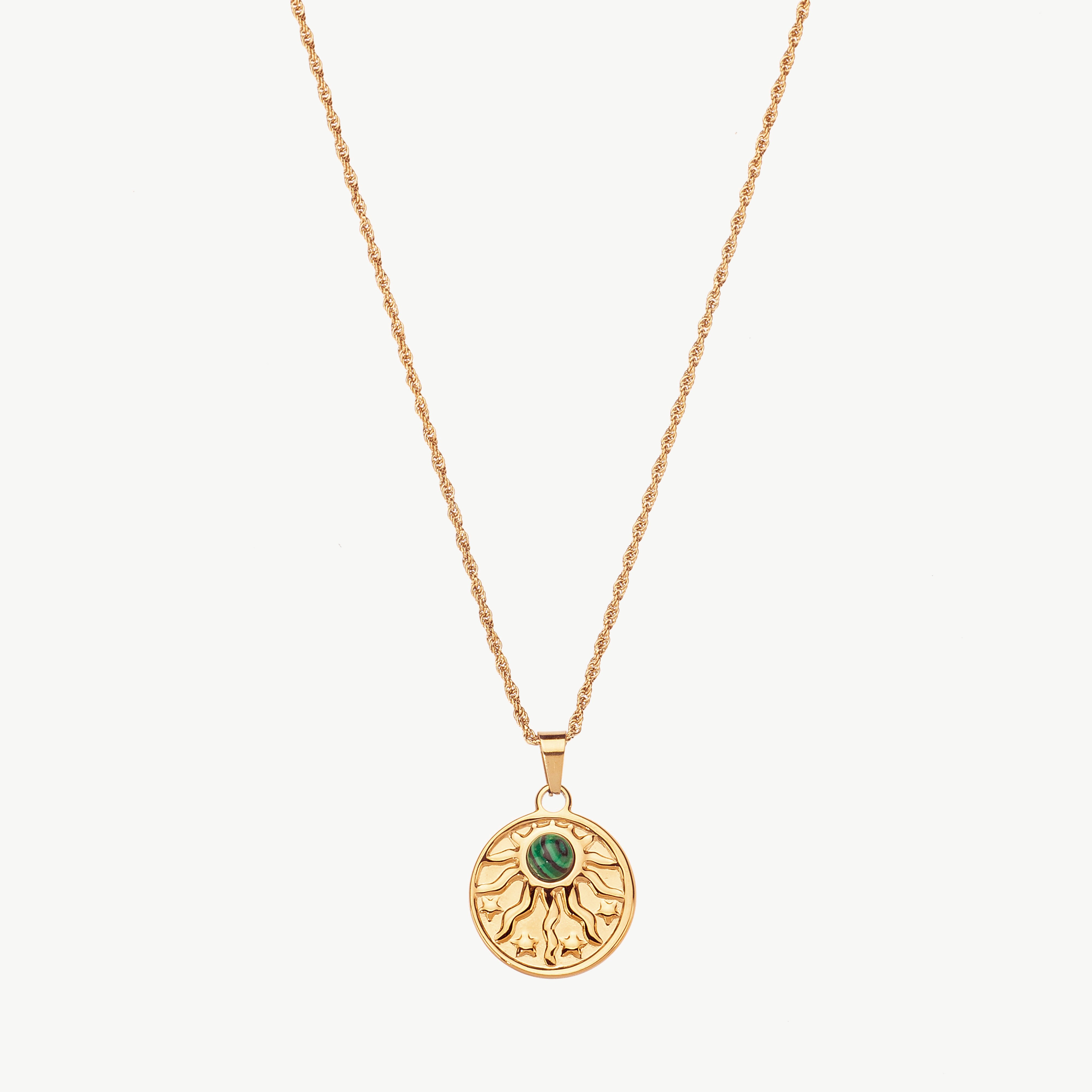 sunburst necklace in gold with radiant coin pendant, sunburst coin necklace with defined rays and polished reflective finish