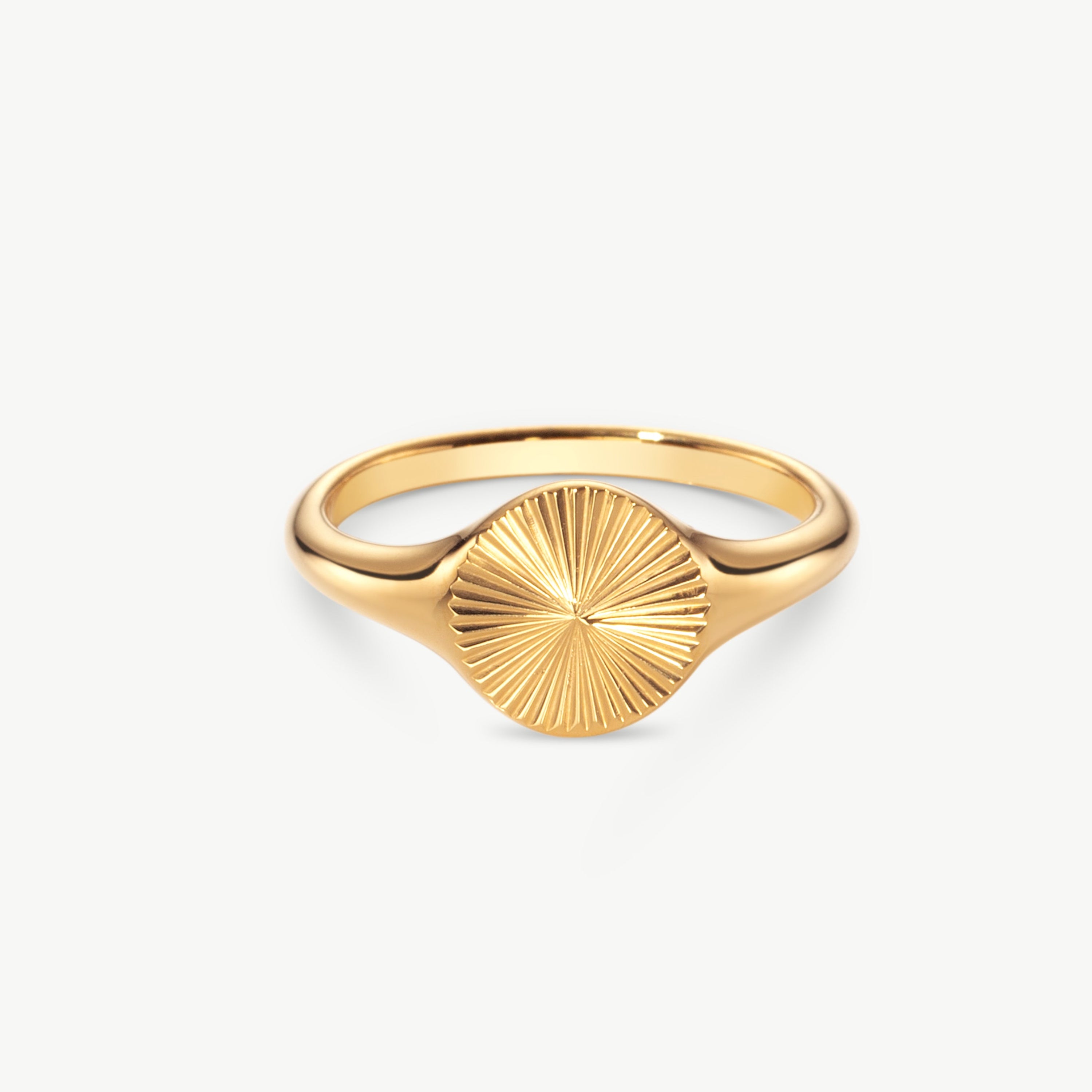 sunburst signet ring in gold with engraved rays, gold signet ring womens style with sun signet ring design and polished surface and radiant detail