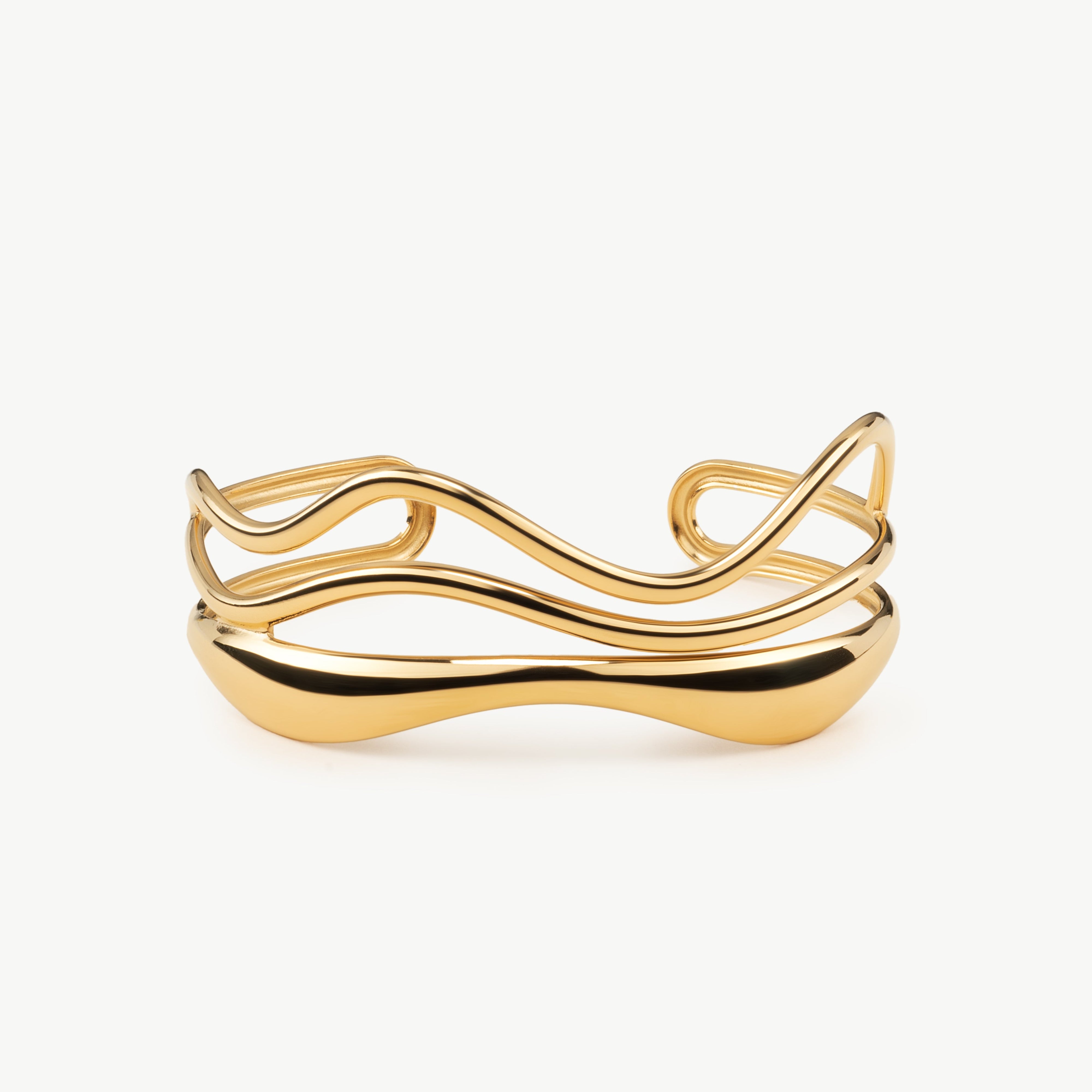 wave cuff bracelet sculptural gold wave bracelet with flowing ocean inspired curves forming a modern wavy gold bangle cuff design