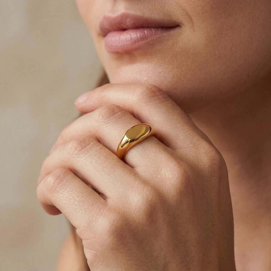 bold dome ring in polished gold with a substantial sculpted silhouette