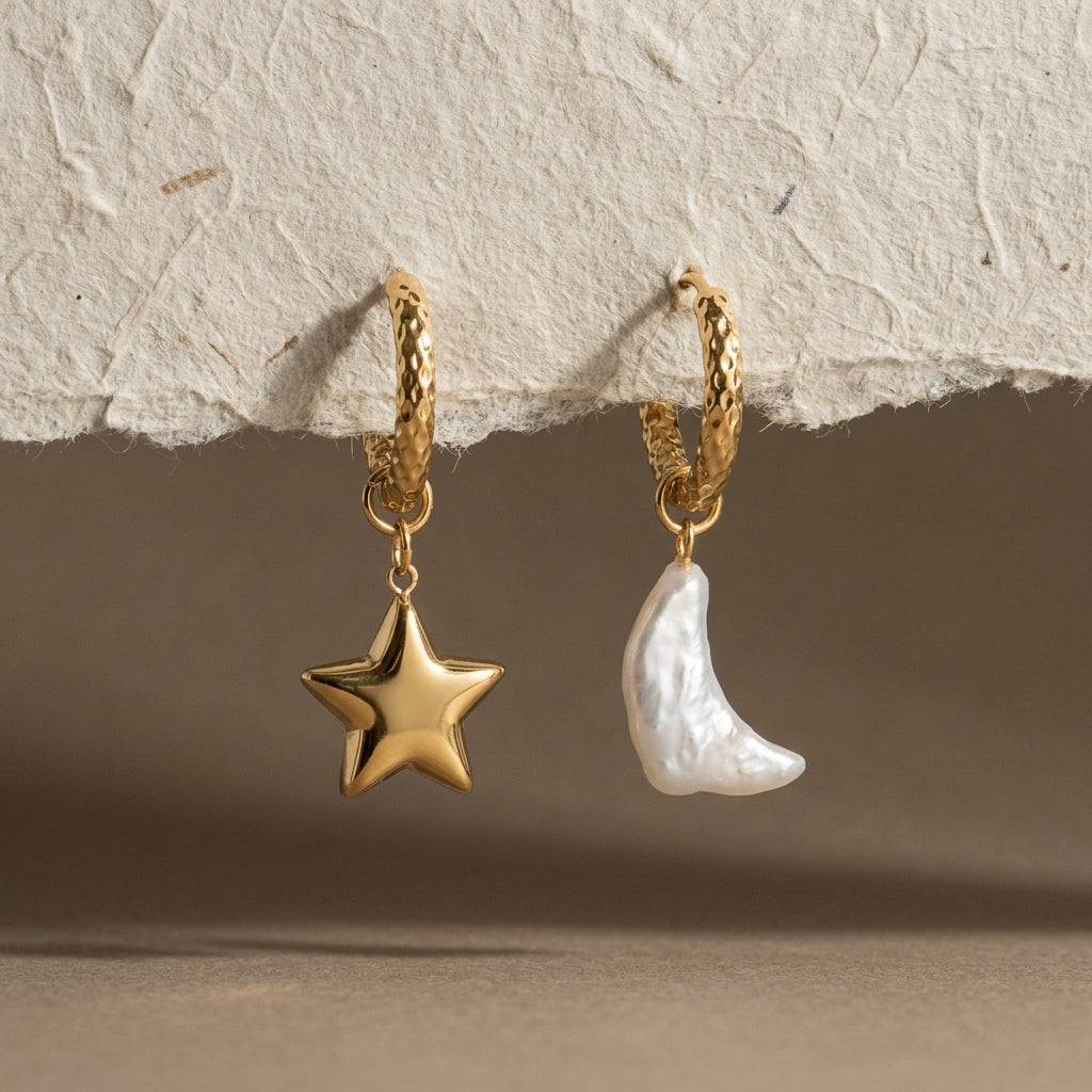 celestial moon and star earrings with a gold finish